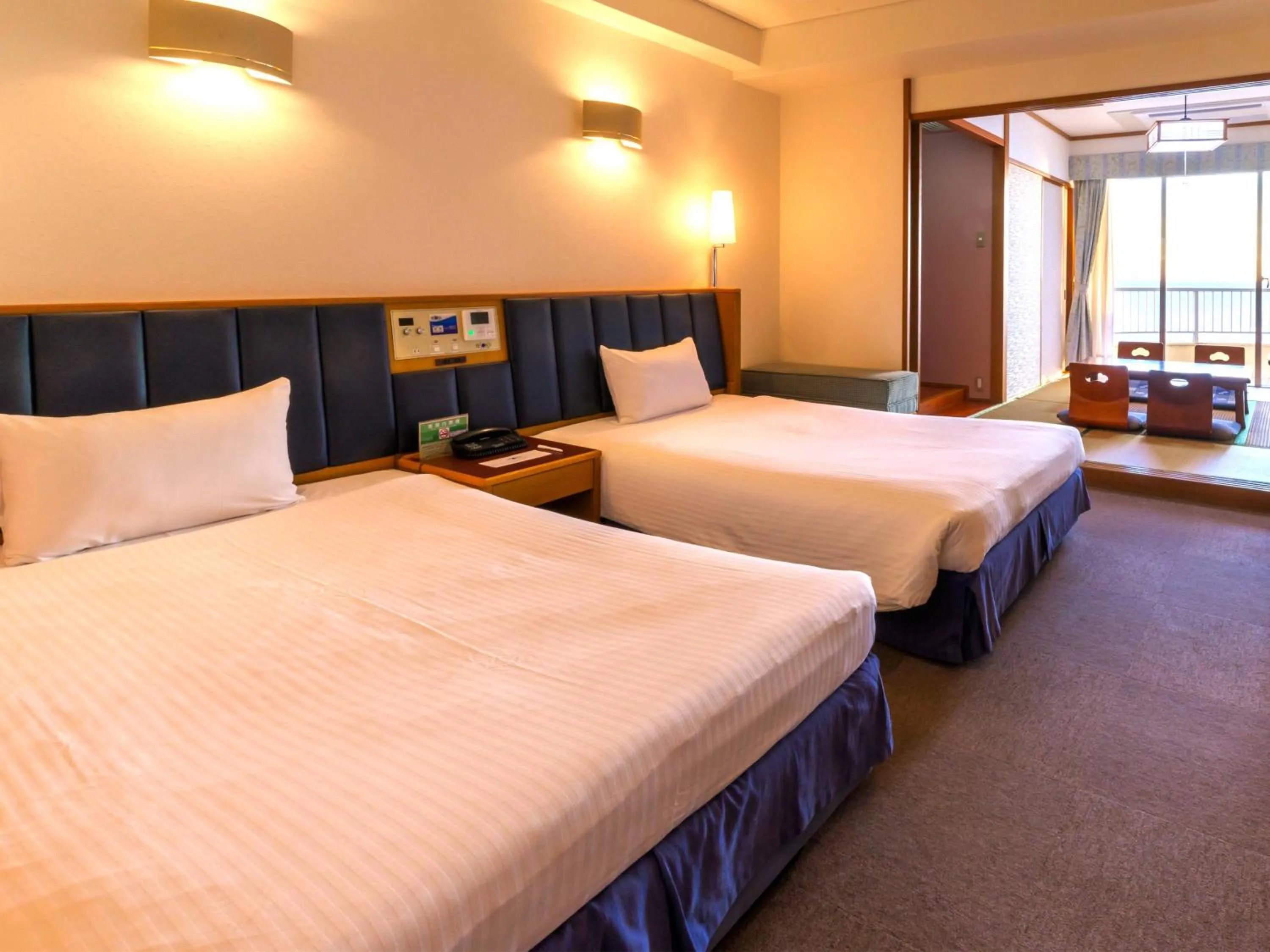Photo of the whole room, Bed in Hotel Resonex Nago