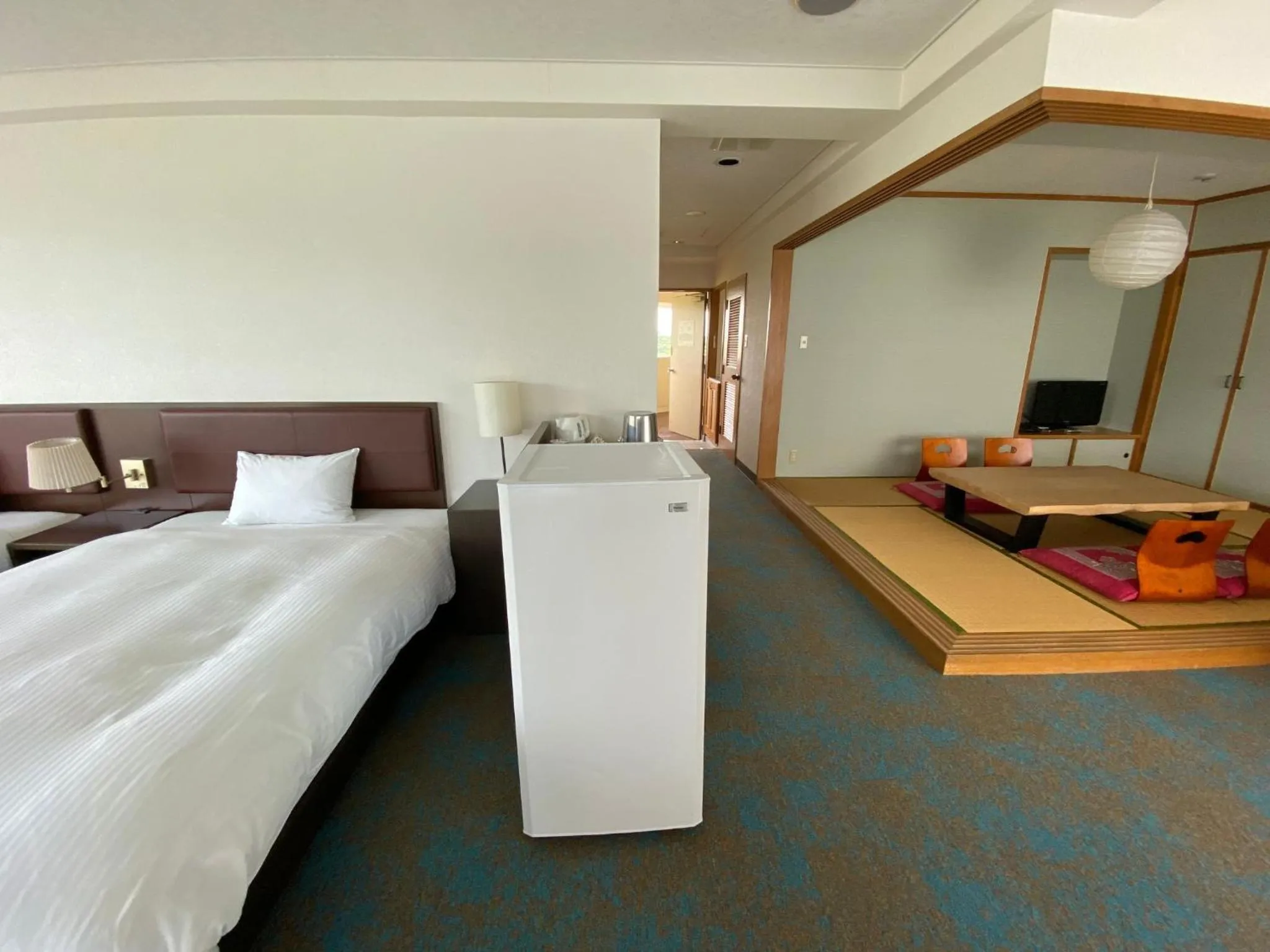 Bed in Hotel Resonex Nago