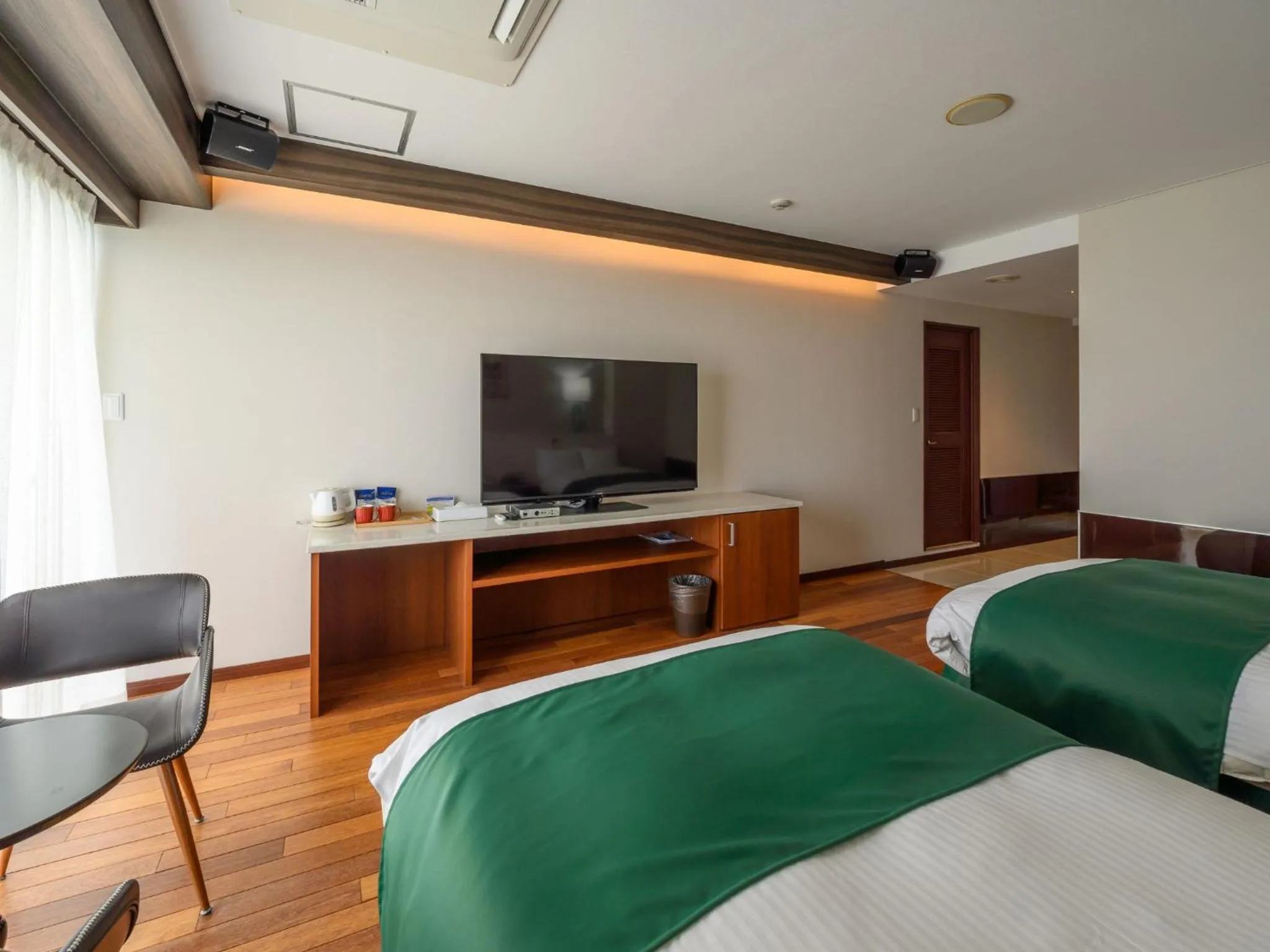 Bed in Hotel Resonex Nago