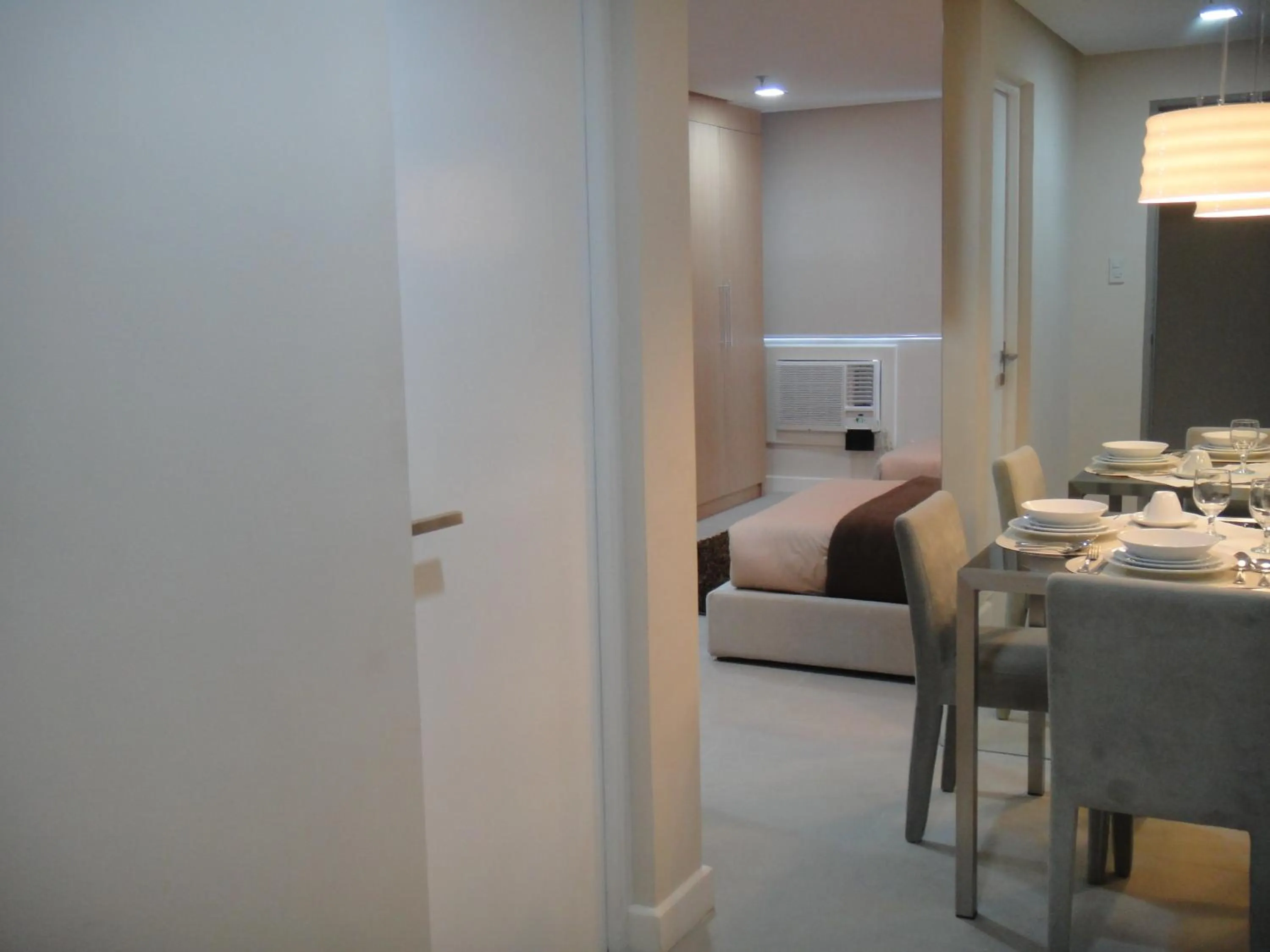 Dining area, Bed in BSA Twin Towers