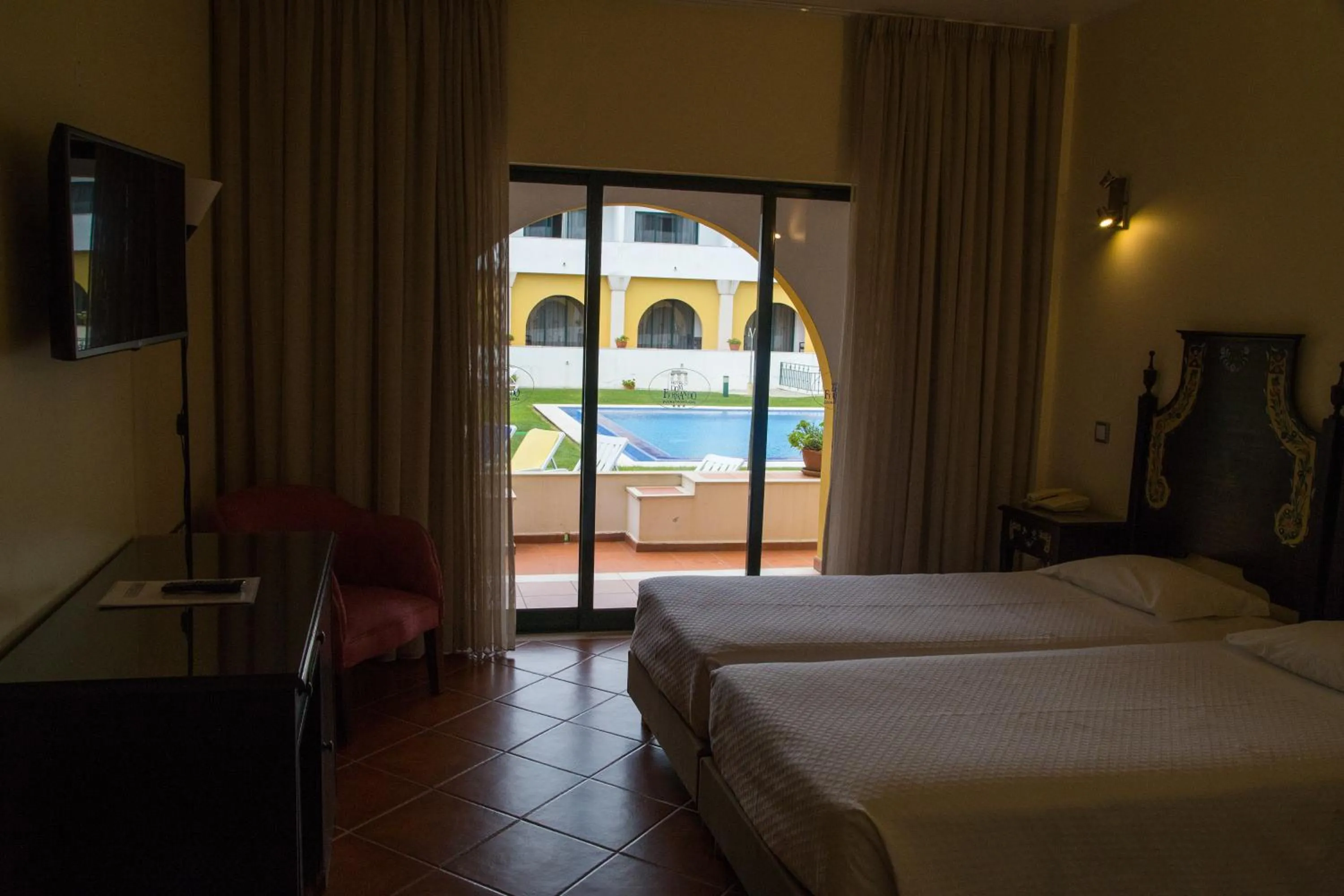 Bed, Pool View in Hotel Dom Fernando