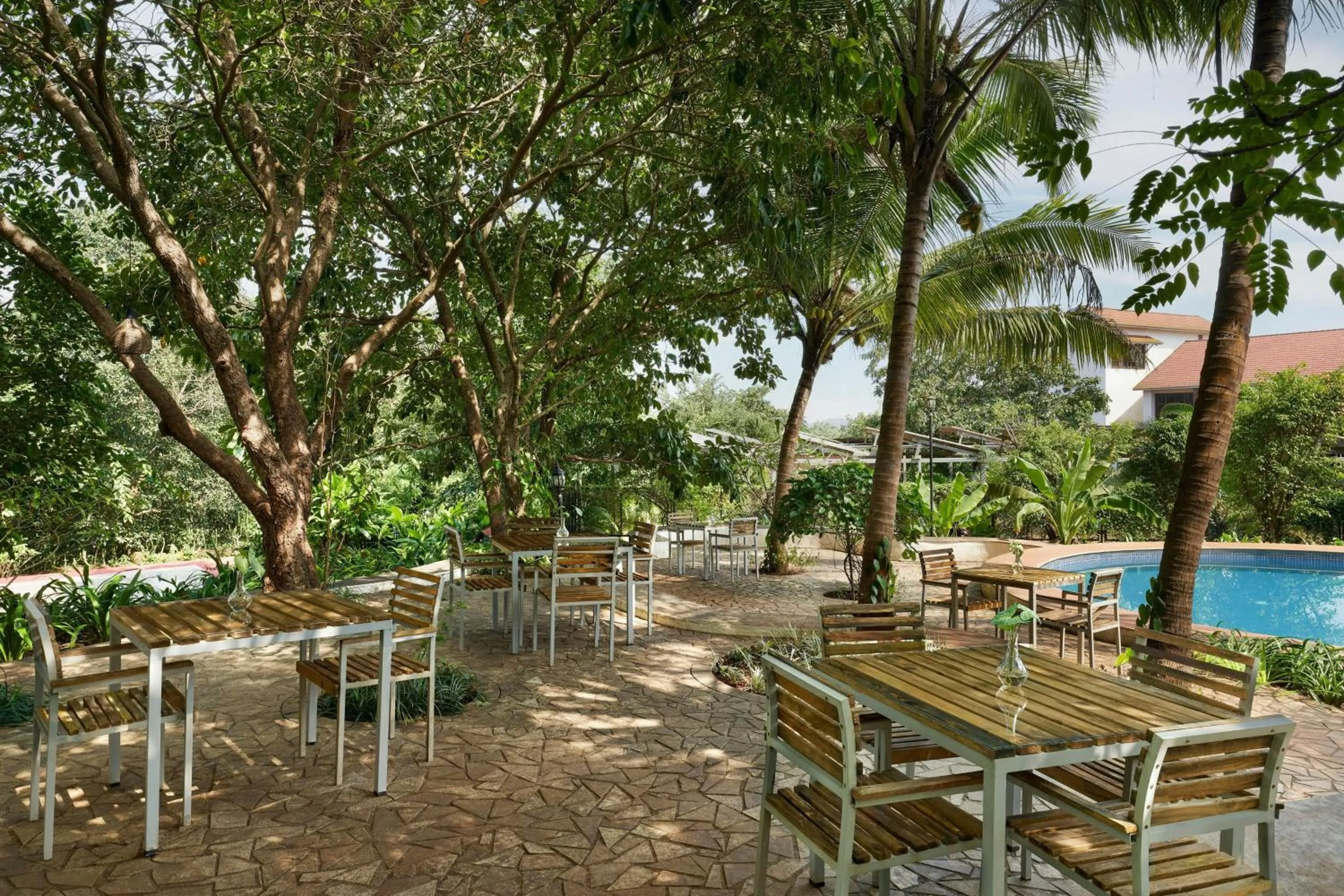 Swimming pool in The Fern Samali Resort Dapoli, Series by Marriott