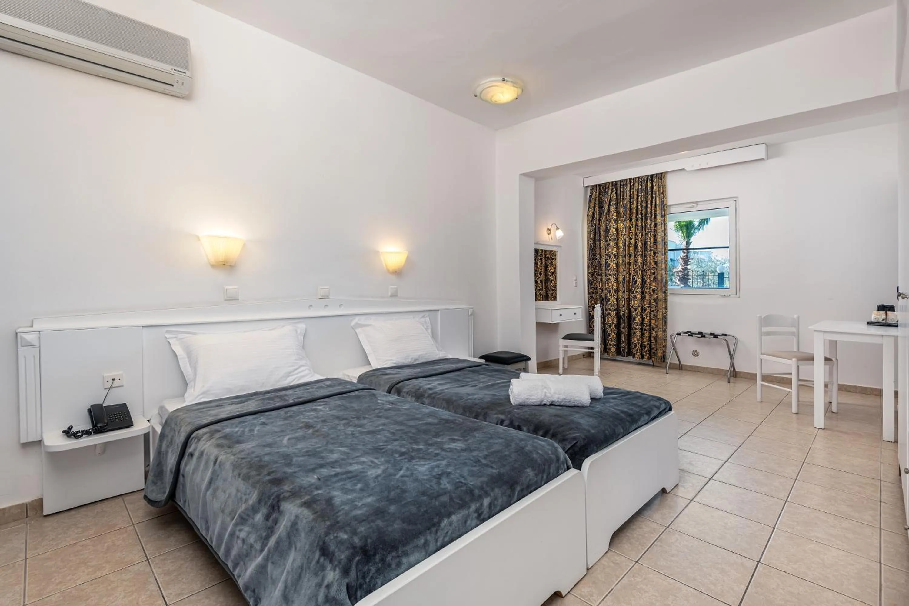 Bed in ILIOS K Village Resort