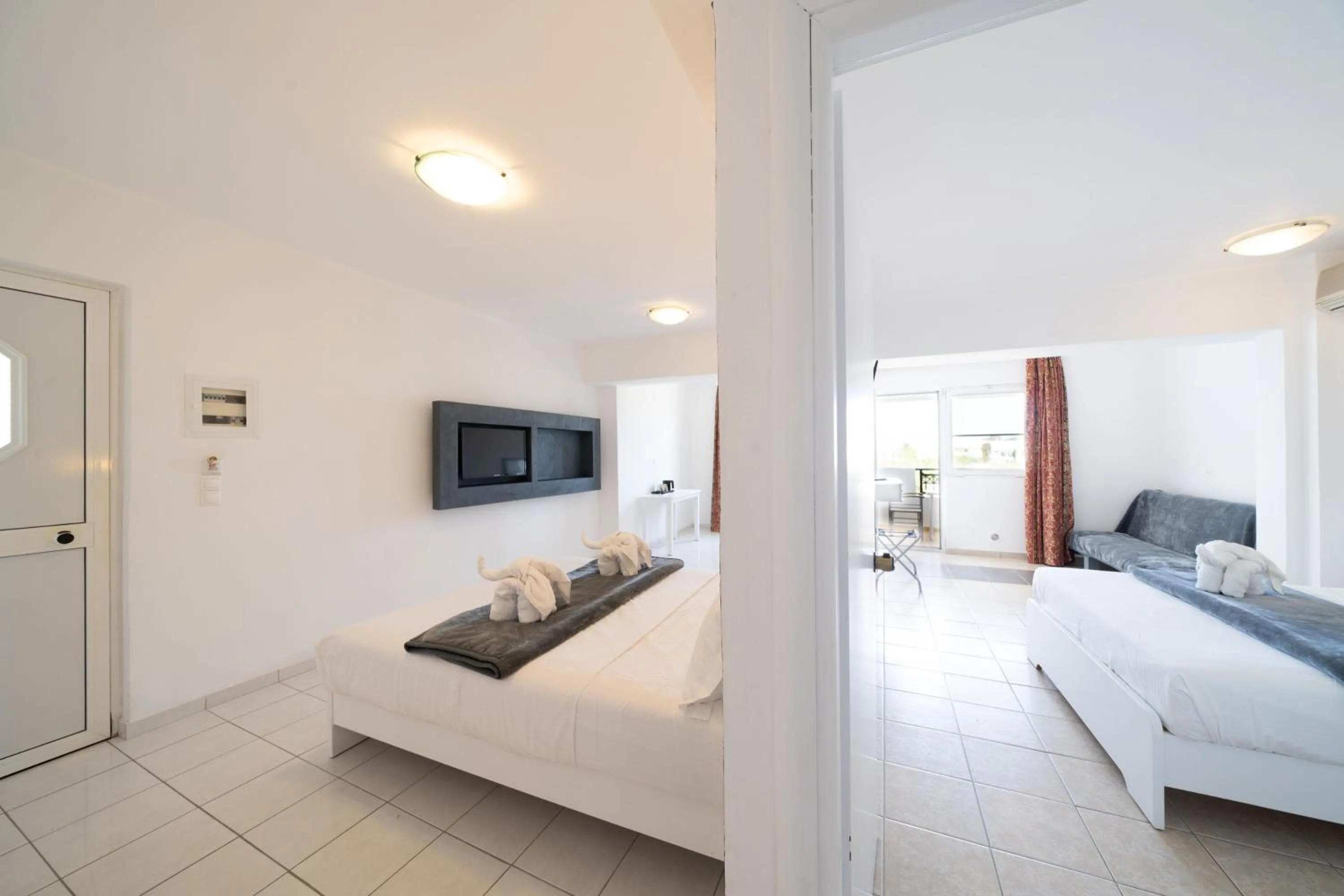 Bed in ILIOS K Village Resort