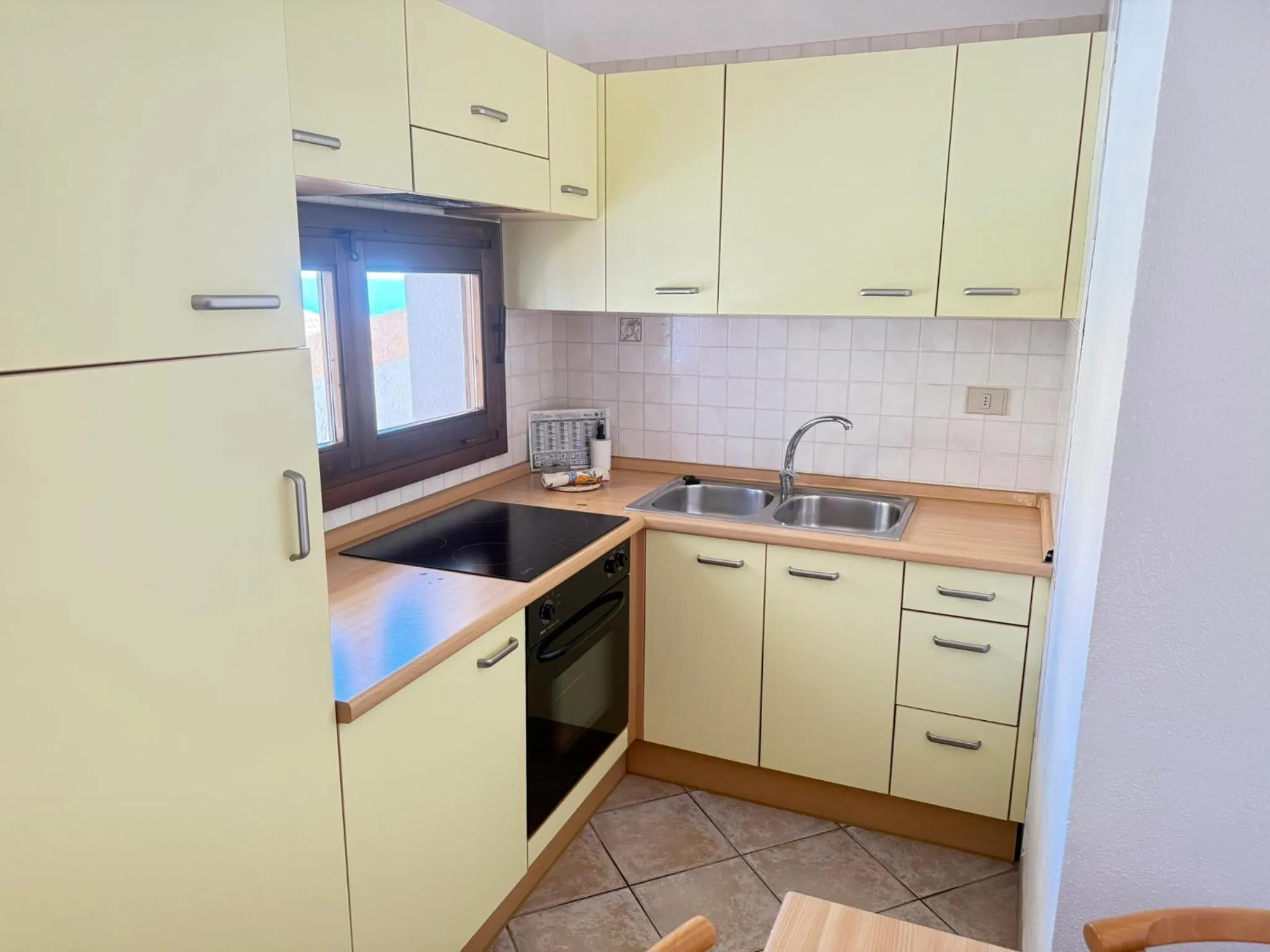 Kitchen or kitchenette in Residence Il Borgo di Porto Corallo