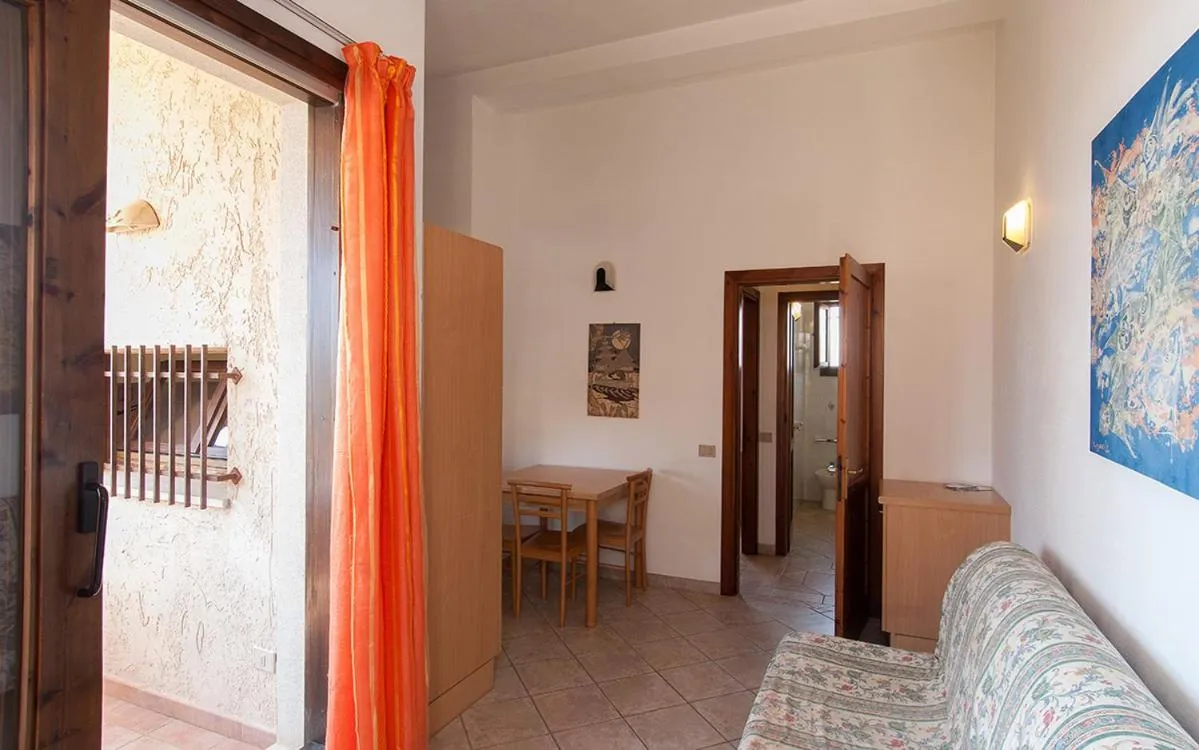 Living room in Residence Il Borgo di Porto Corallo