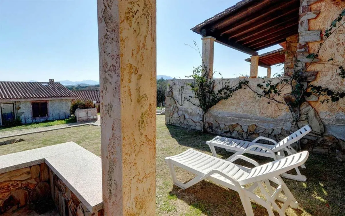 Garden view in Residence Il Borgo di Porto Corallo