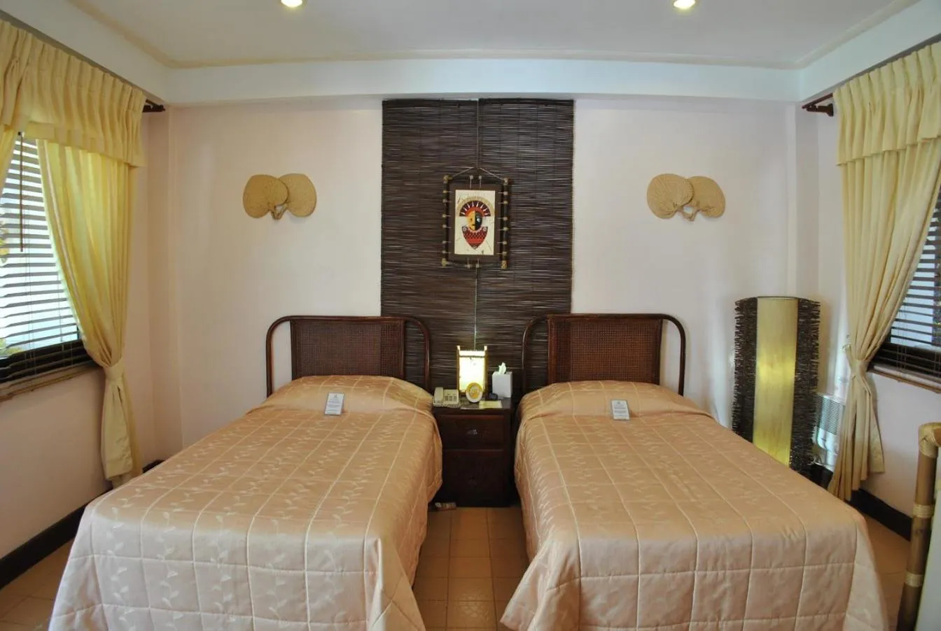 Bed in Surfside Boracay Resort