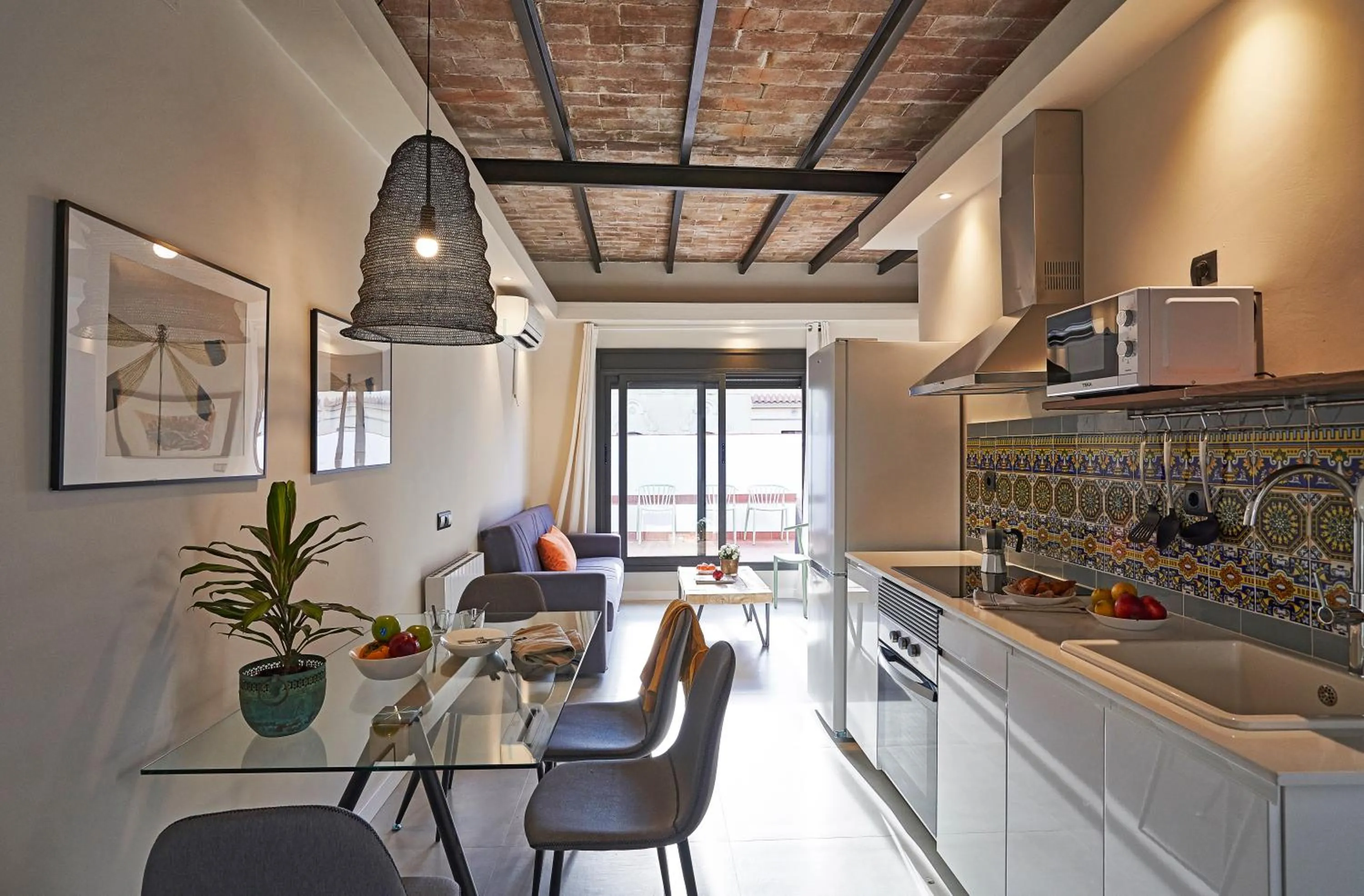 Kitchen or kitchenette in AinB Eixample-Miro Apartments