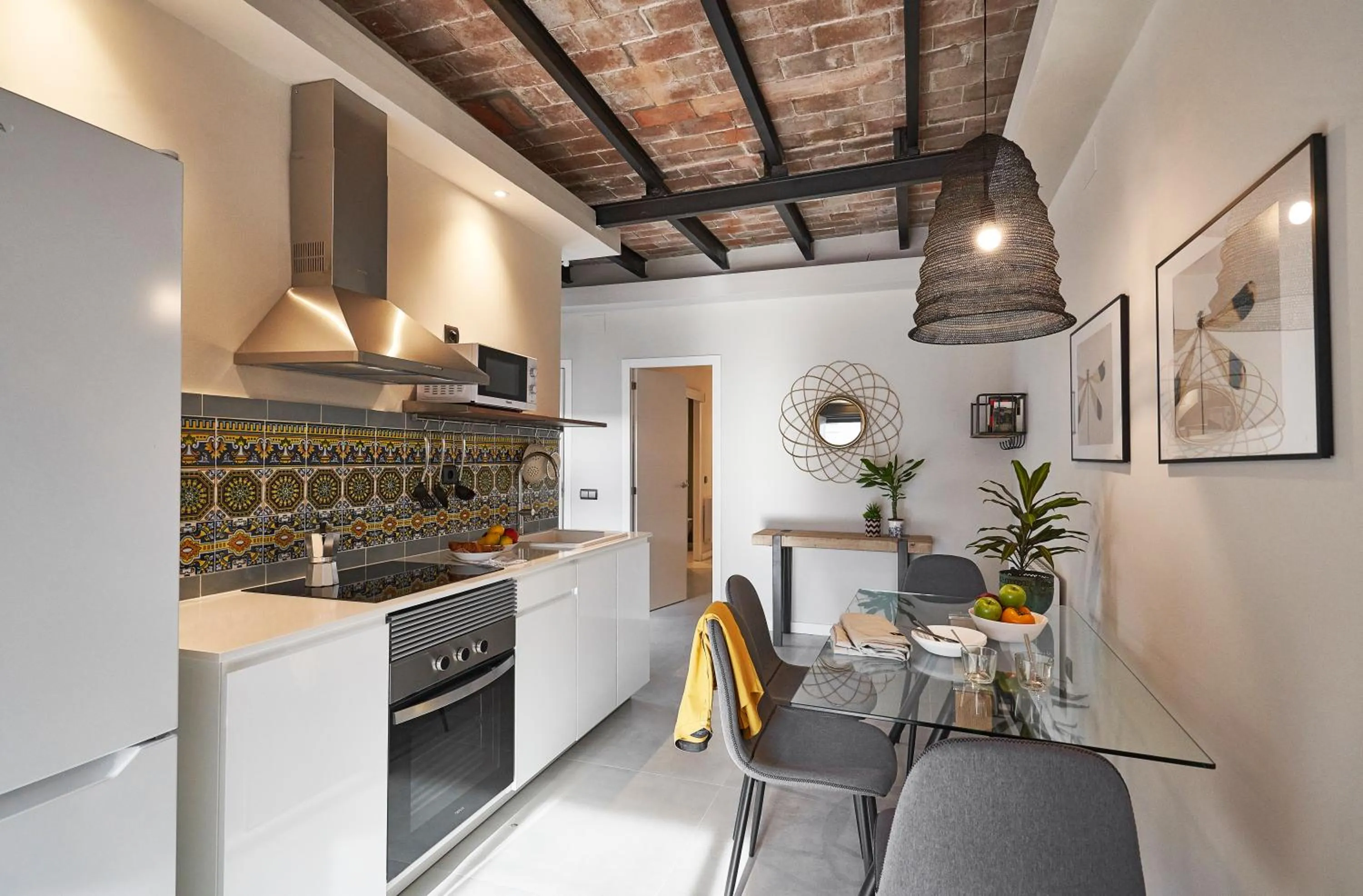 Kitchen or kitchenette in AinB Eixample-Miro Apartments