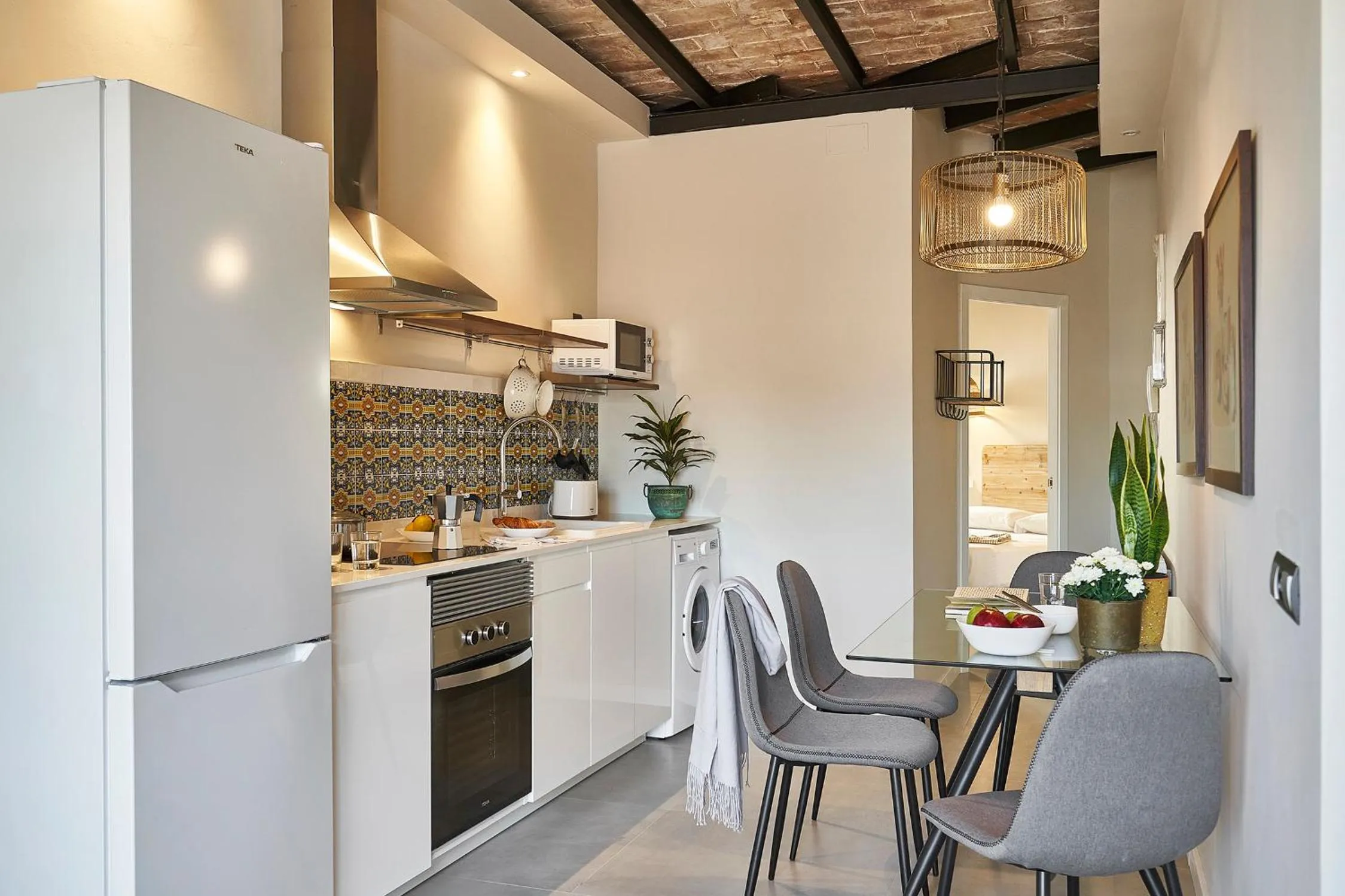 Kitchen or kitchenette in AinB Eixample-Miro Apartments