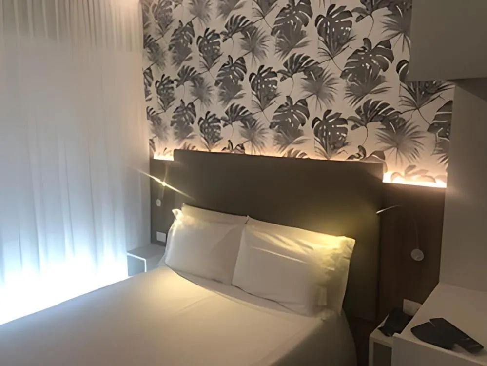 Bed in Hotel Derby S