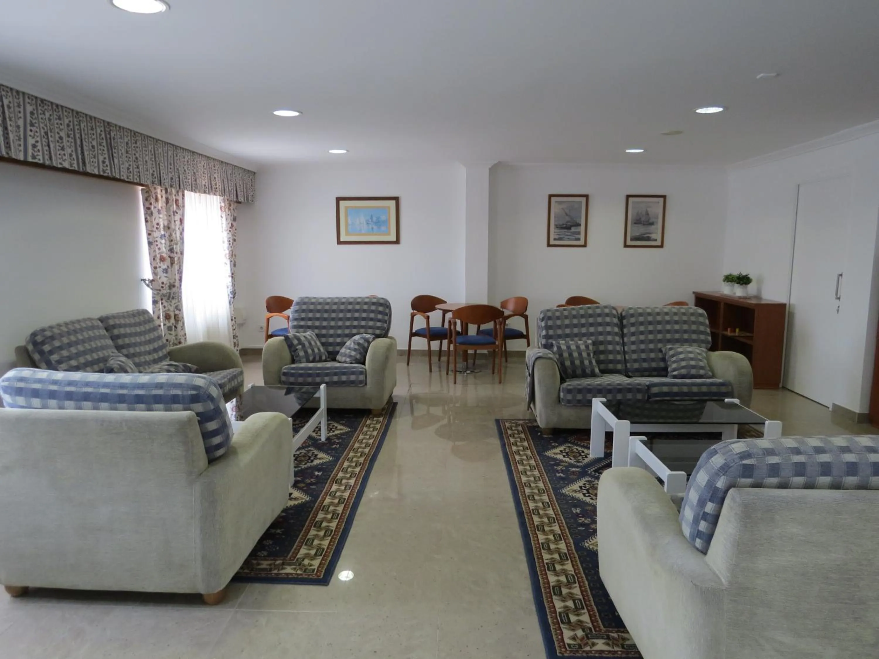 Communal lounge/ TV room in Hotel La Lanzada