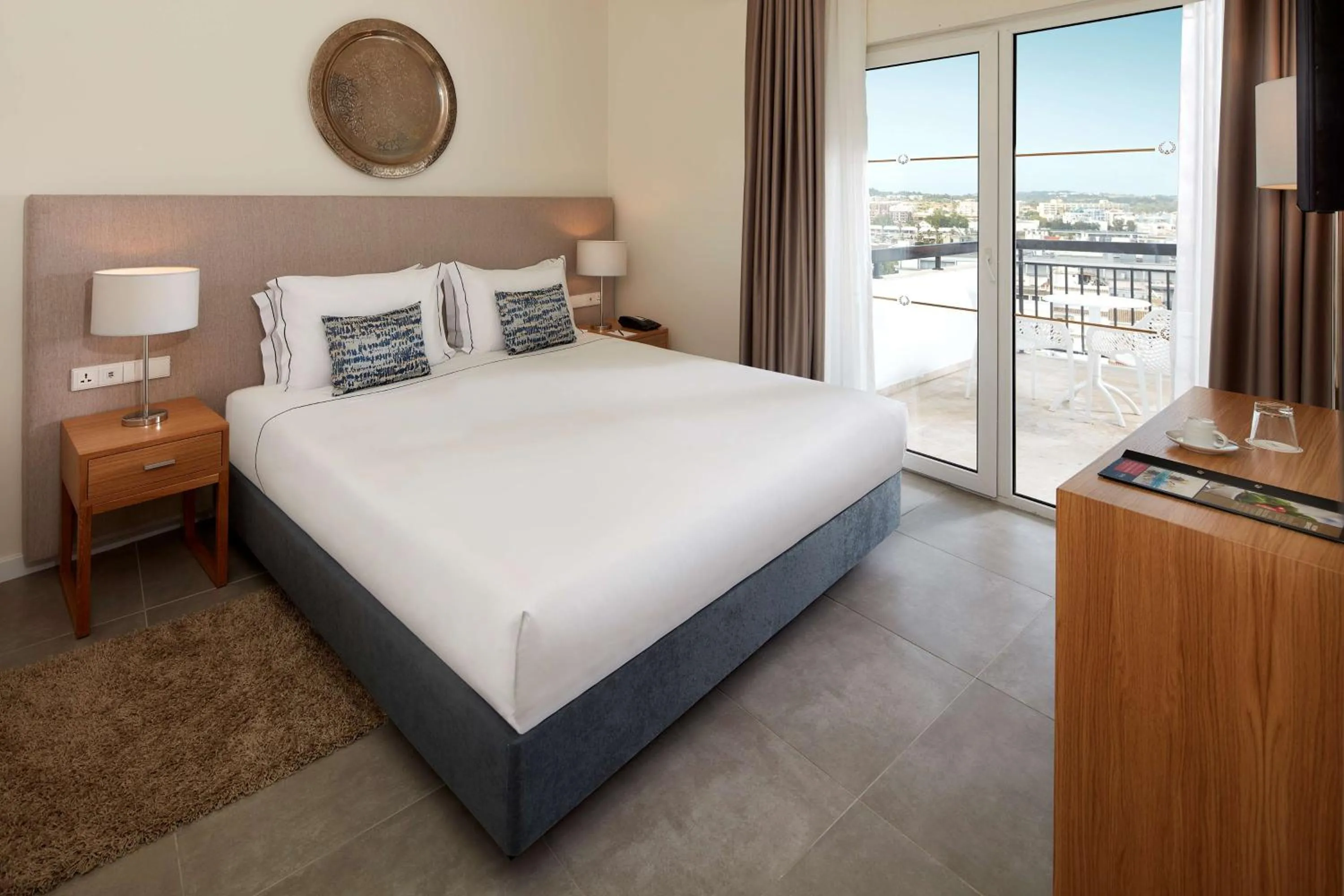 View (from property/room), Bed in Tivoli Lagos