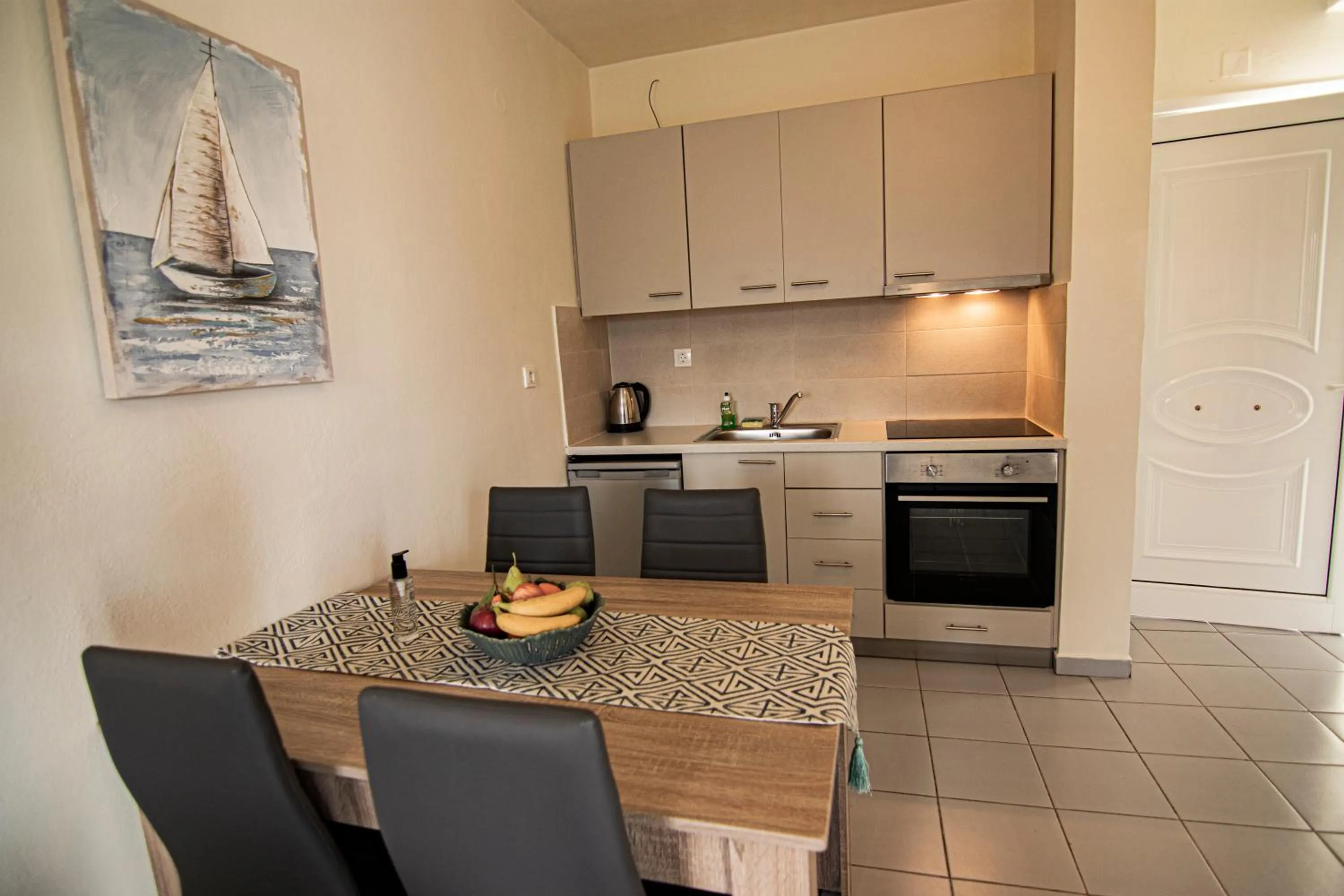 Kitchen or kitchenette in Castri Village Hotel