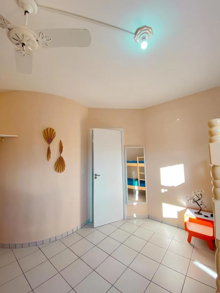 Photo of the whole room in Apto lindo e aconchegante com piscina 202A