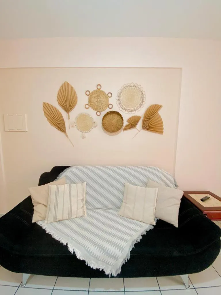 Living room in Apto lindo e aconchegante com piscina 202A