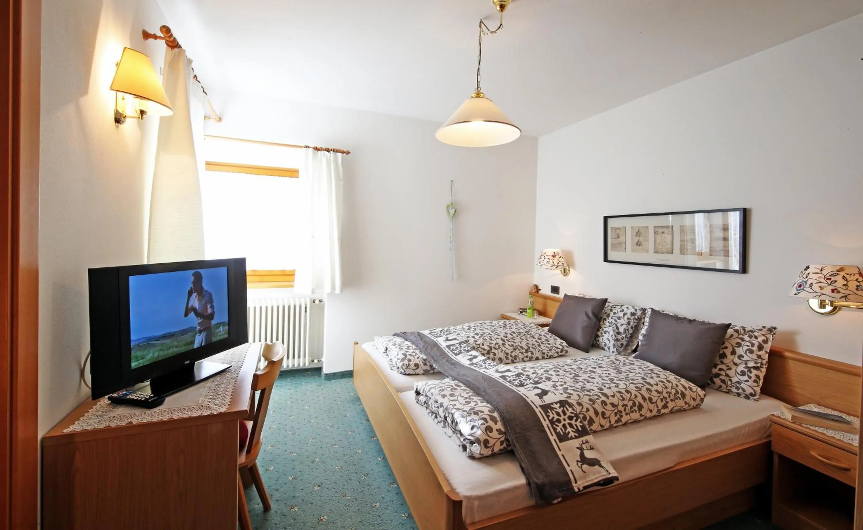 Bed in Ciasa Rudiferia Appartamenti in Alta Badia