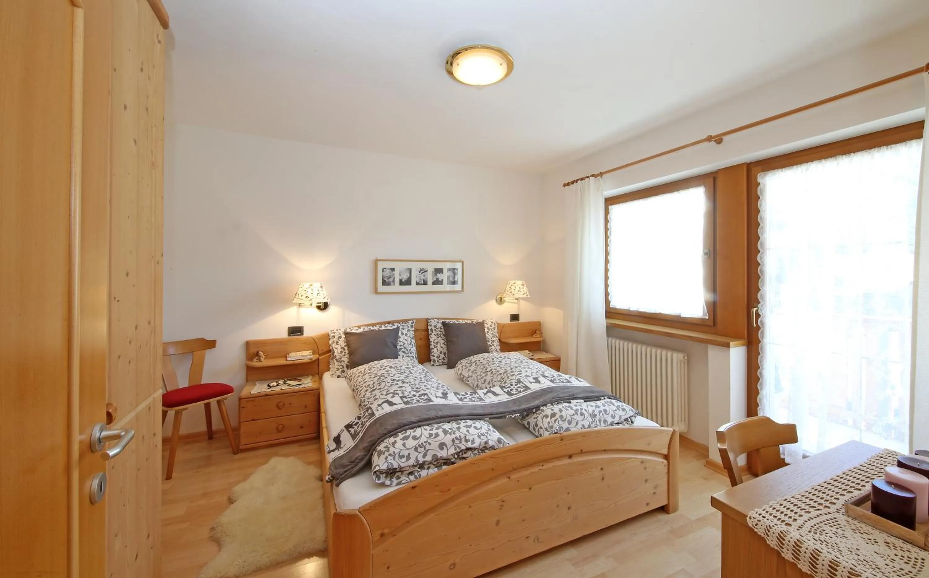 Photo of the whole room, Bed in Ciasa Rudiferia Appartamenti in Alta Badia
