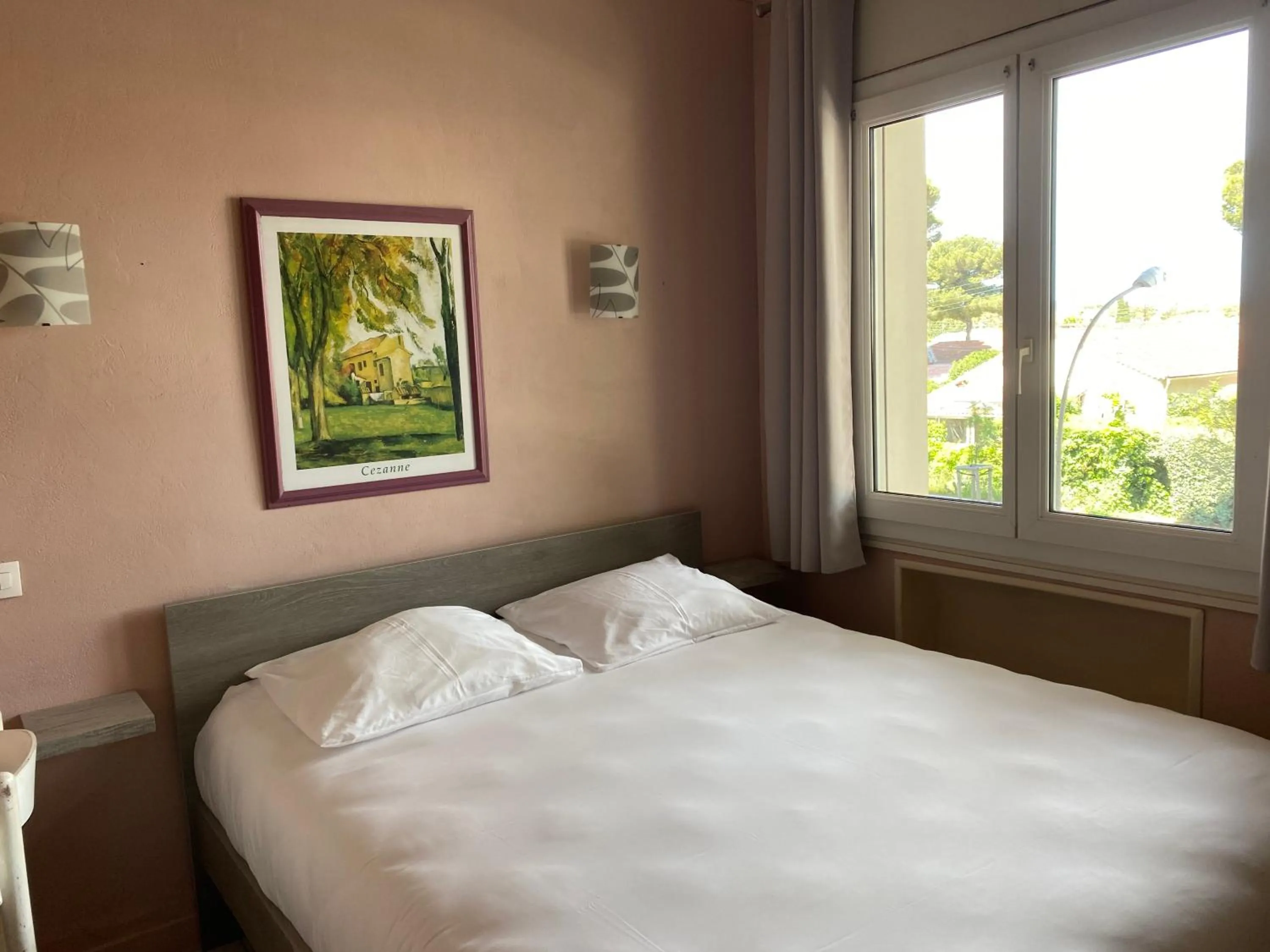 Bed in Hotel Le Ceinturon