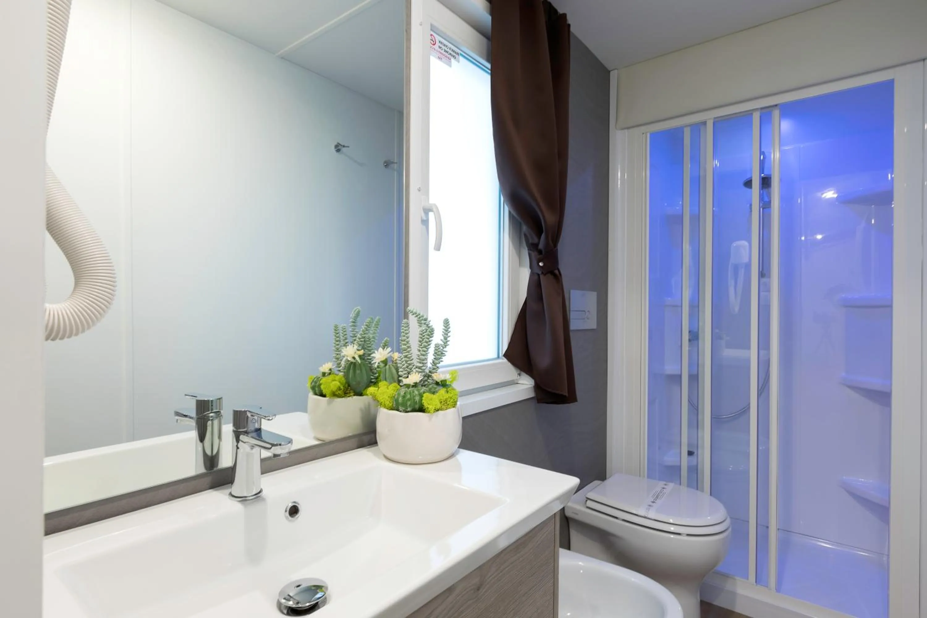 Bathroom in Vela Blu Camping Village