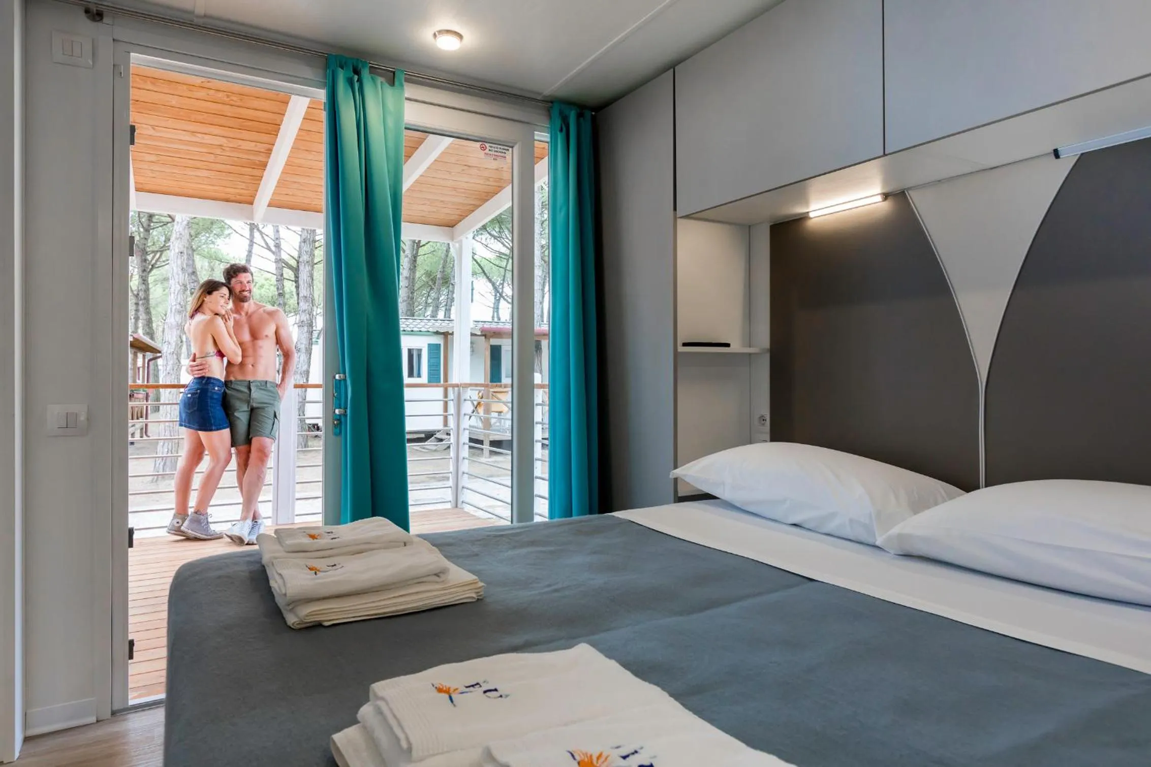 Patio, Bed in Vela Blu Camping Village