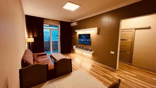 Communal lounge/ TV room, Bed in Shah Inn Panoramic Apartments 2BR Flame Towers View Old City Nizami St