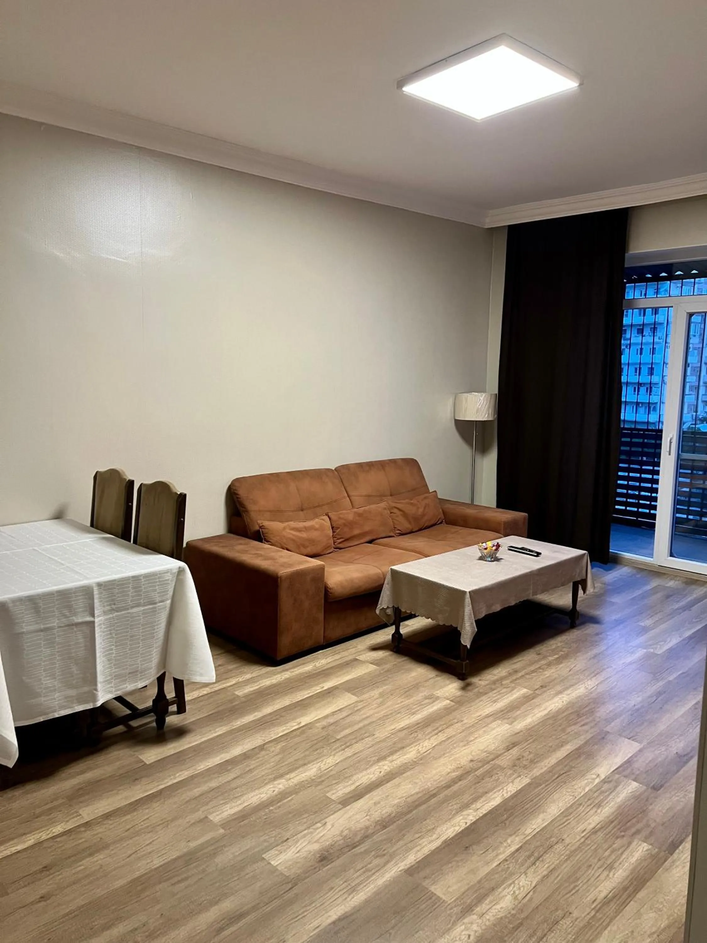 Living room in Panoramic 2BR Flame Towers View Old City Nizami St