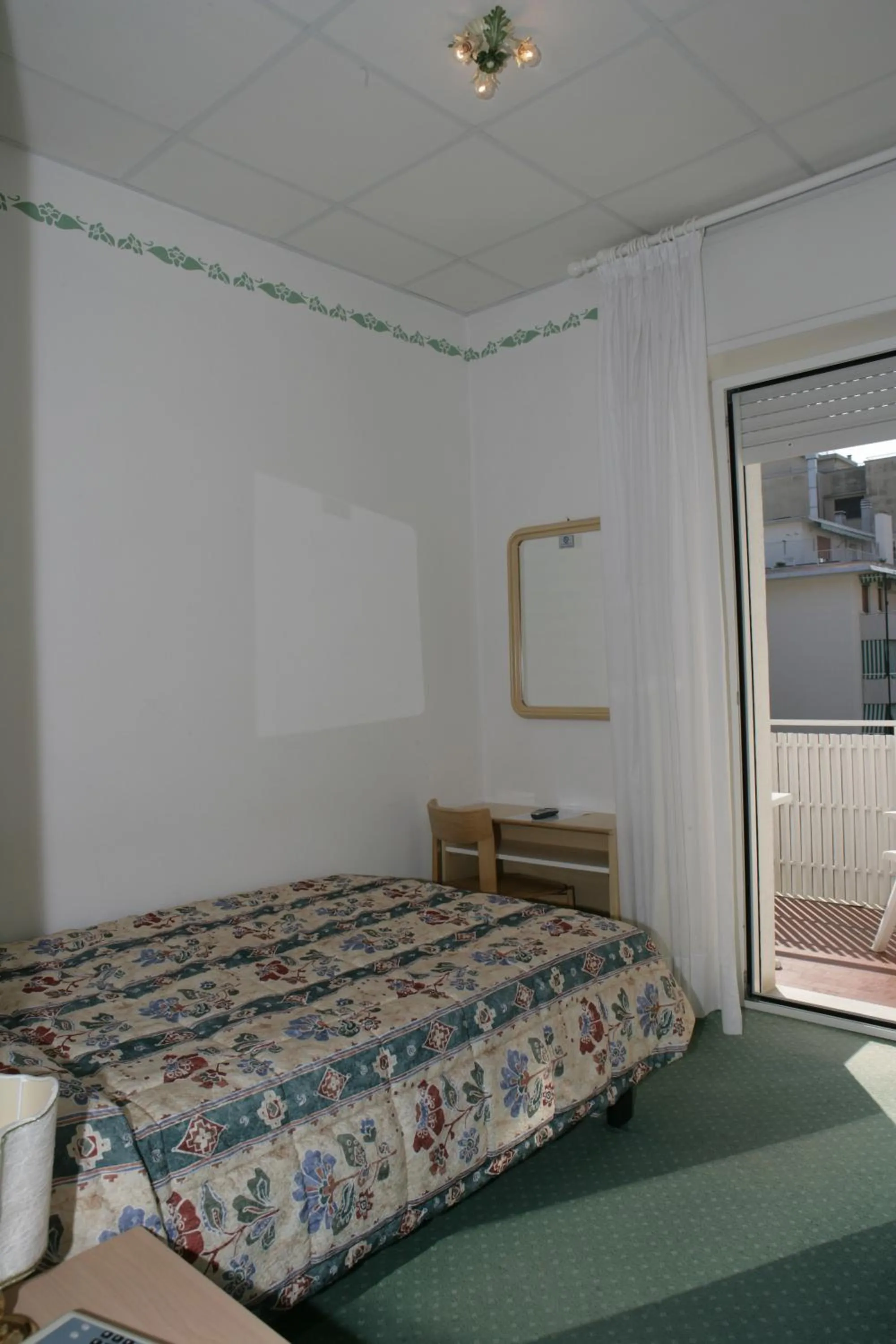 Bed in Hotel Villa Rosa