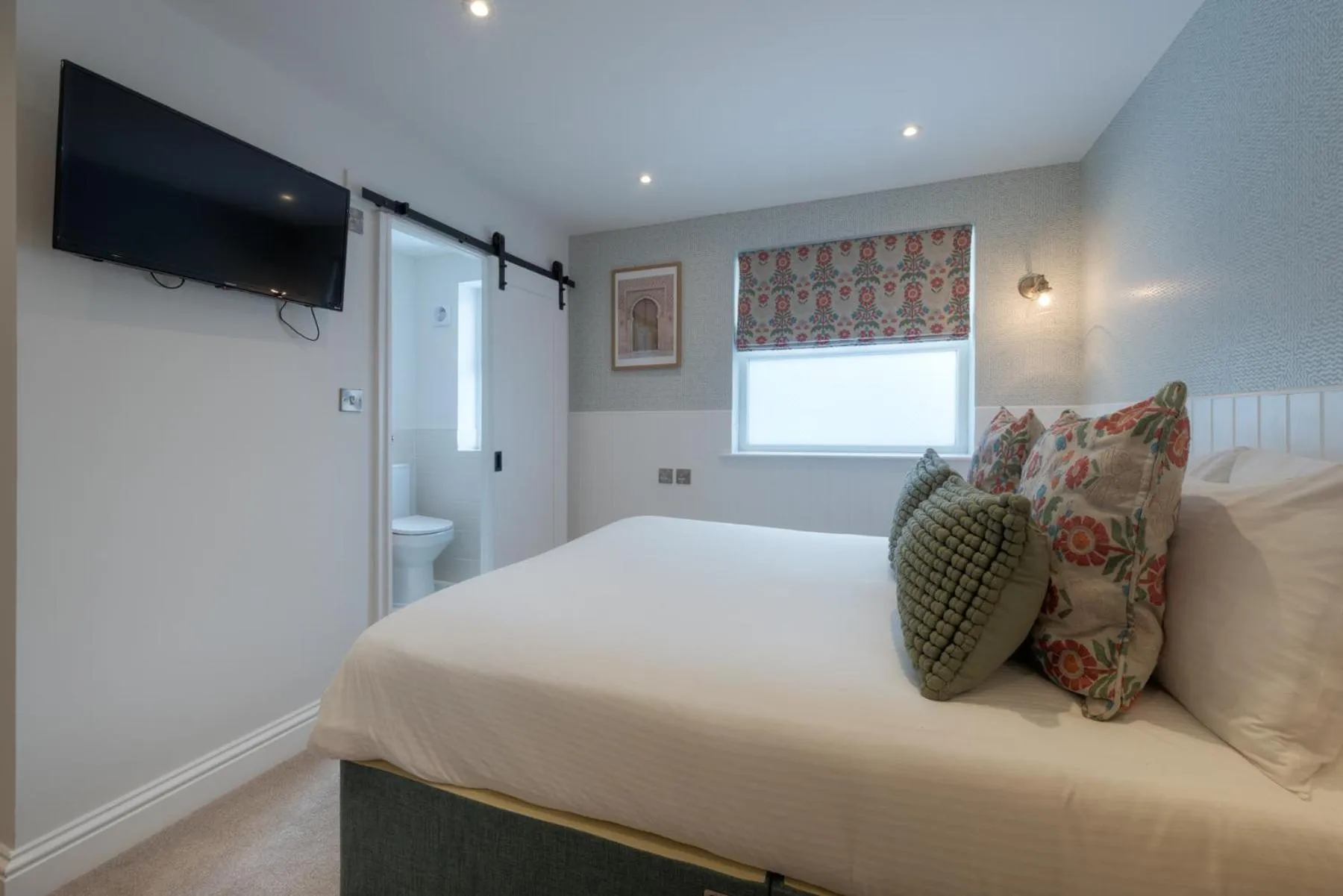 Bed in Florence Suite Boutique Hotel and Restaurant