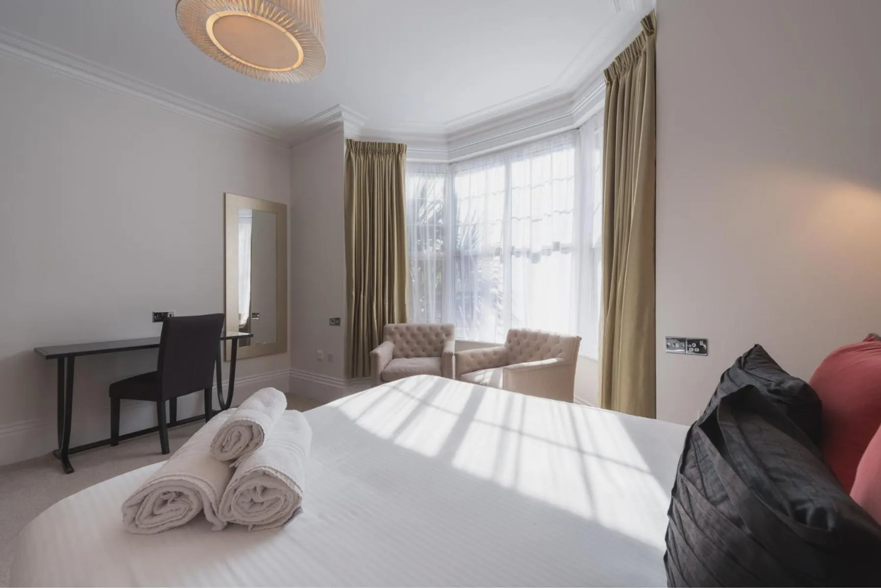 Bed in Florence Suite Boutique Hotel and Restaurant