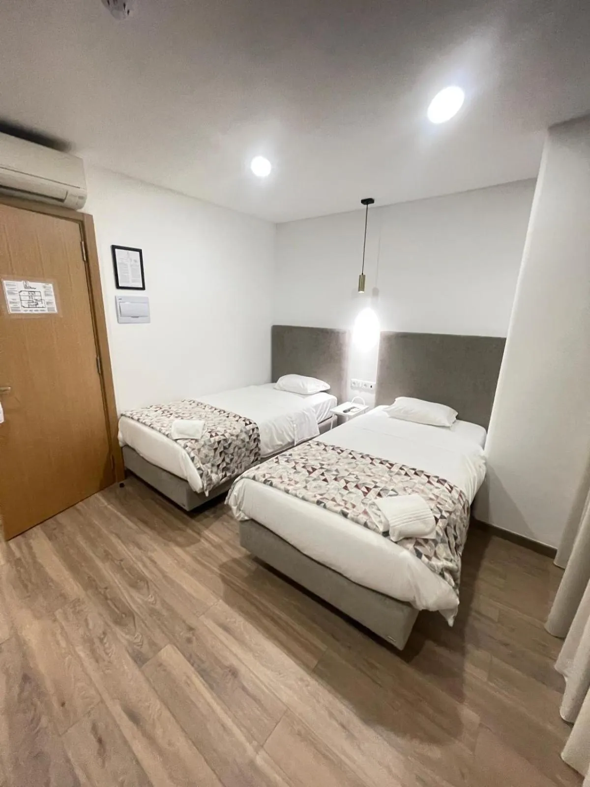 Bed in Hotel Flamingo