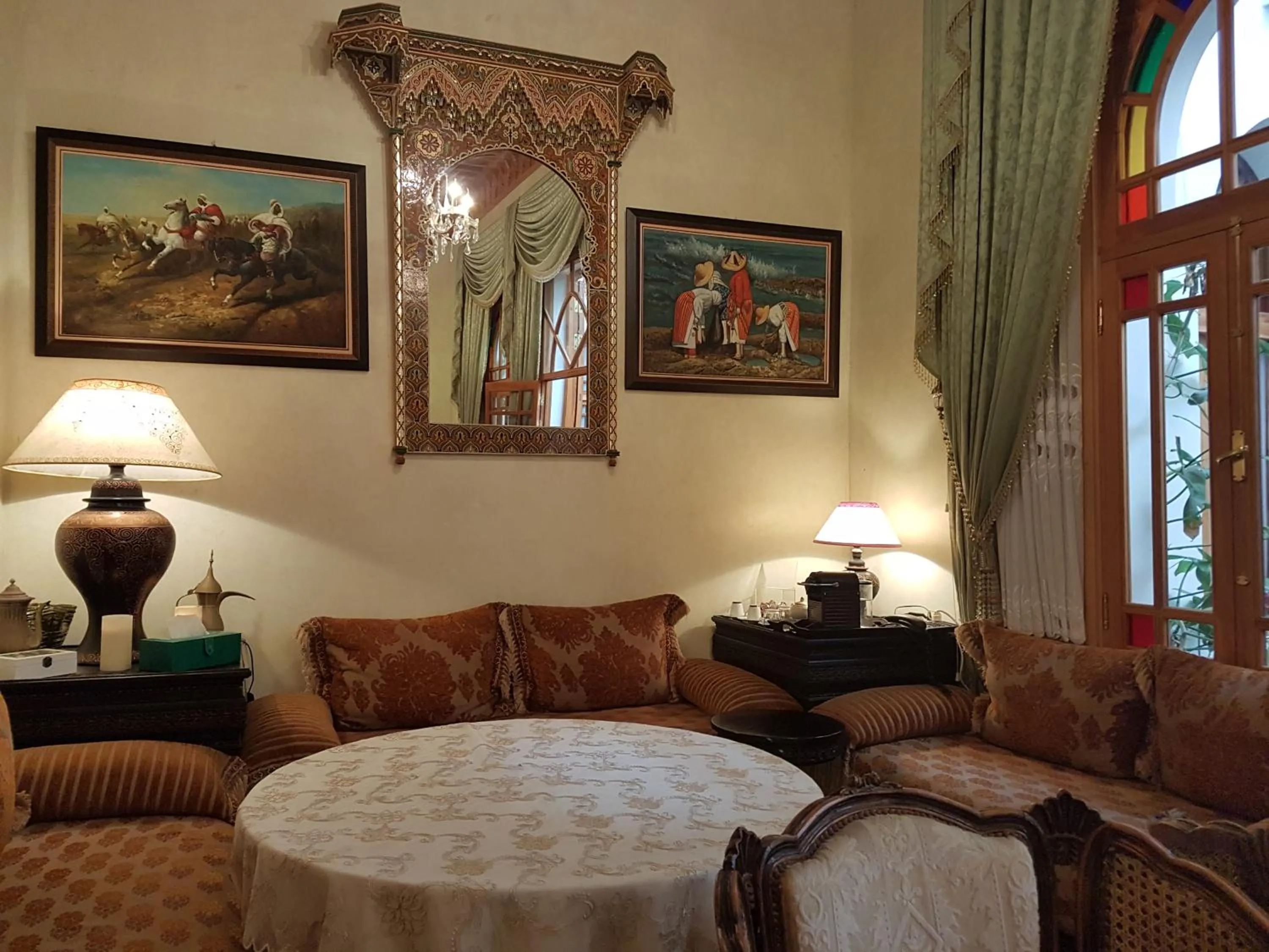 Communal lounge/ TV room in Riad Dar Karima