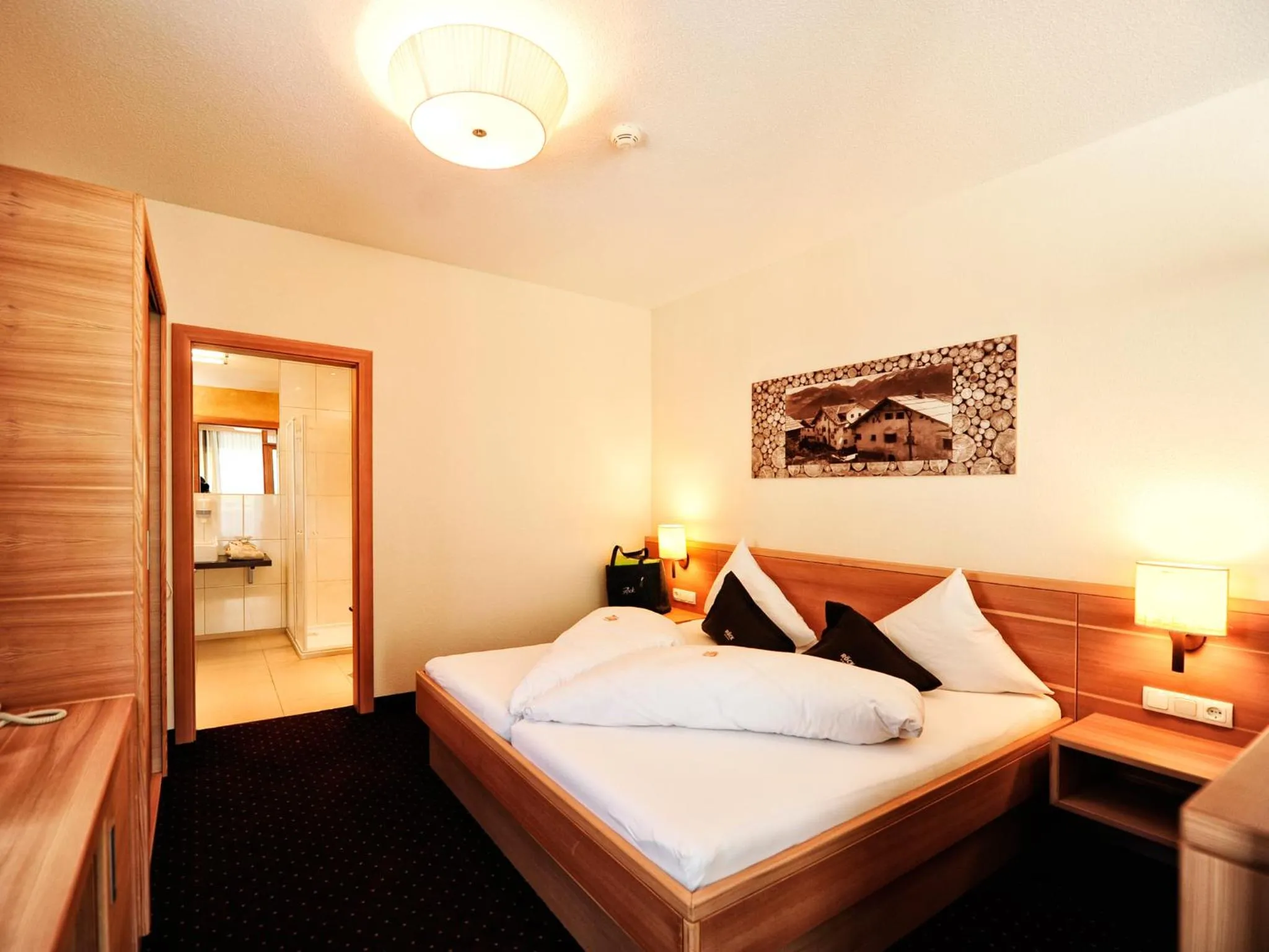 Bed in Hotel Röck Garni