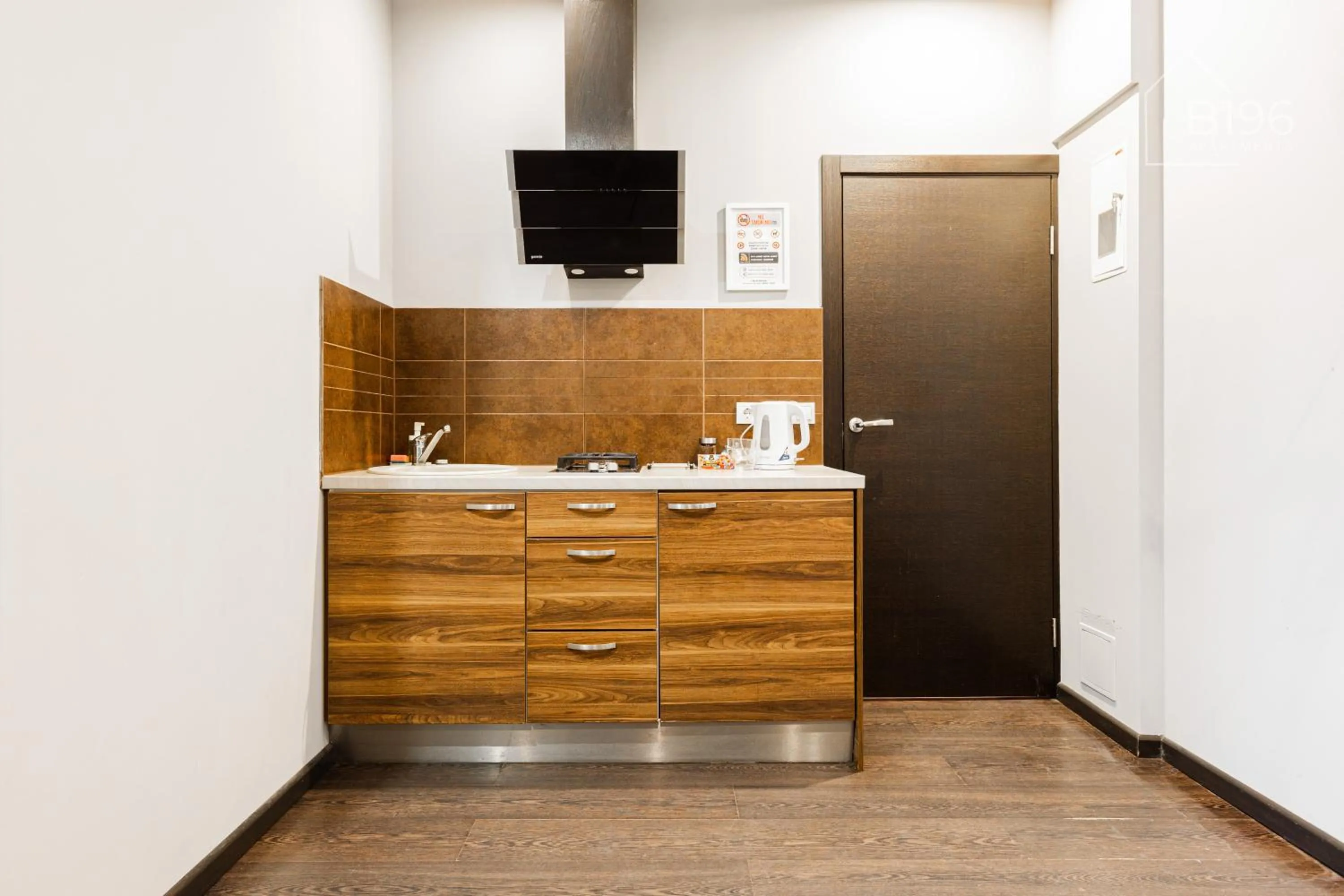 kitchen in ApartHotel Riga