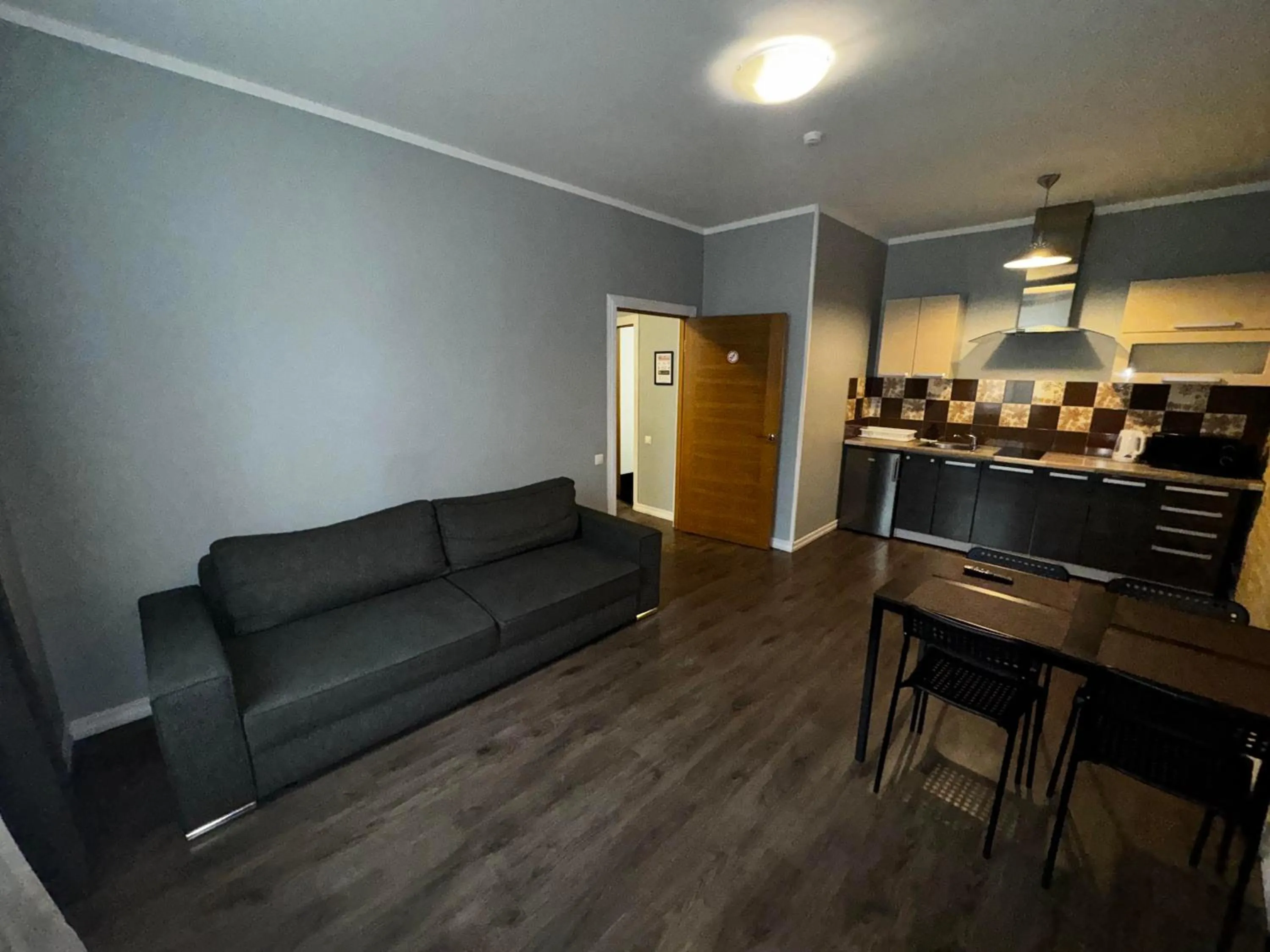 Kitchen or kitchenette in ApartHotel Riga