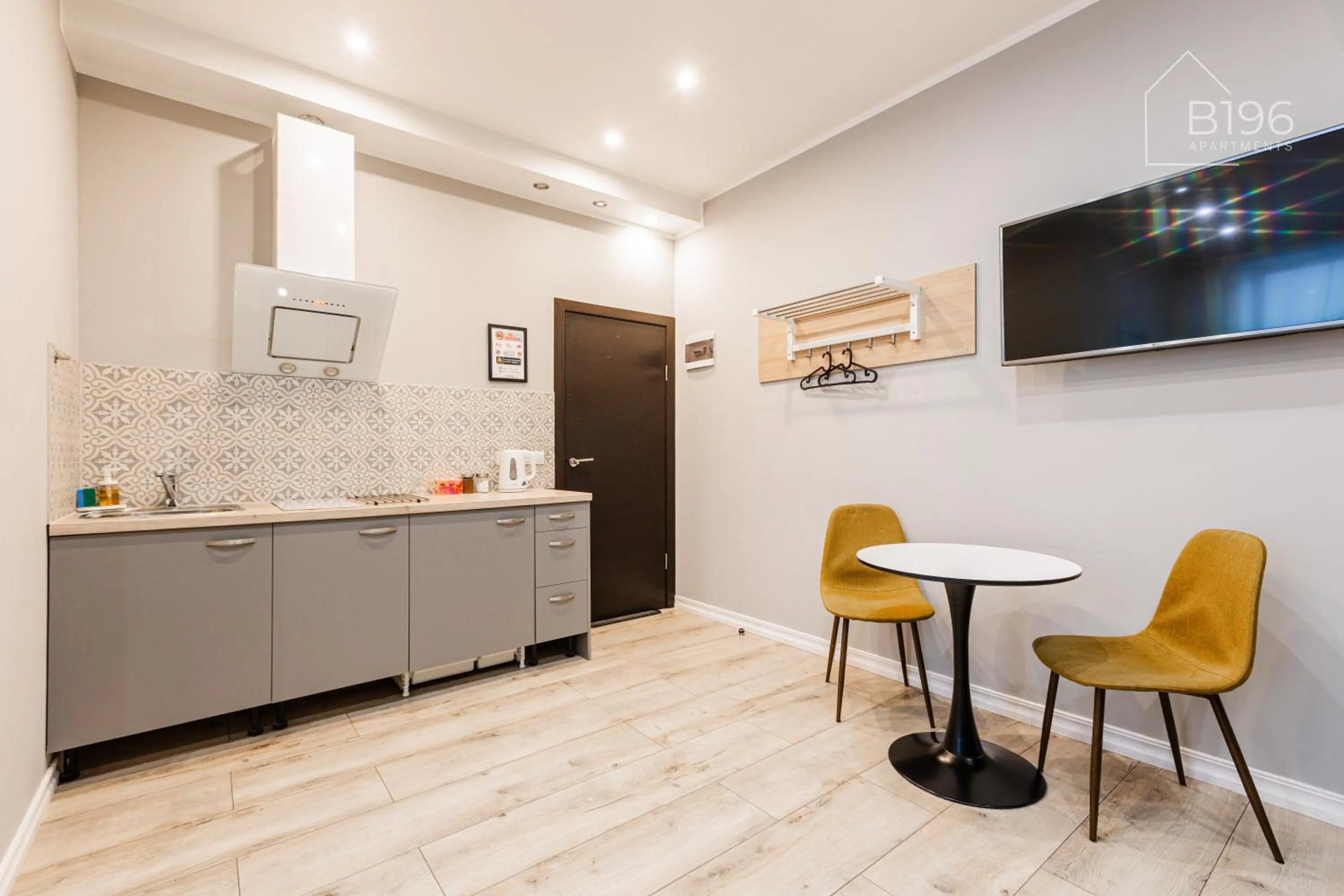 Kitchen or kitchenette in ApartHotel Riga