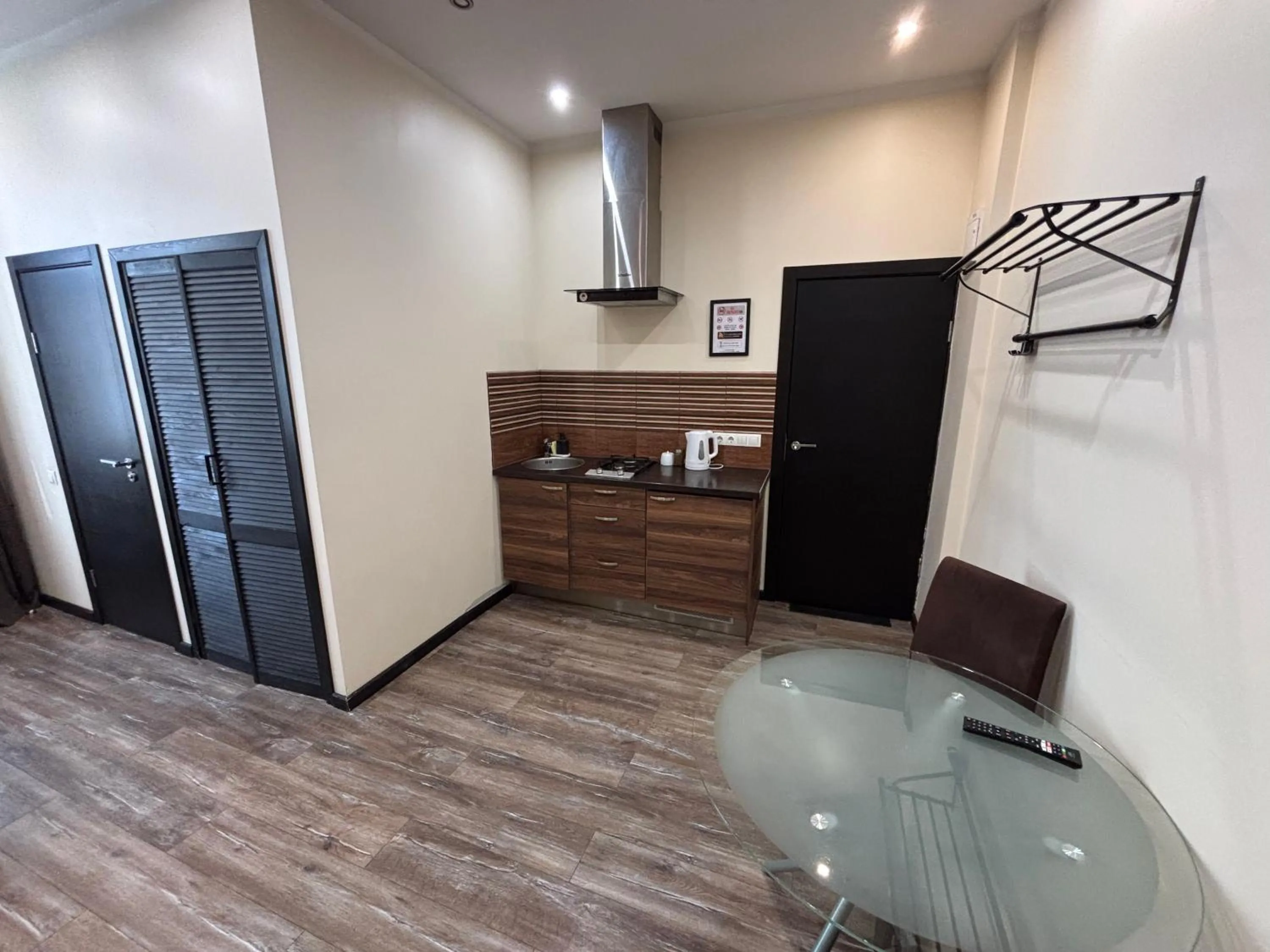 Kitchen or kitchenette in ApartHotel Riga