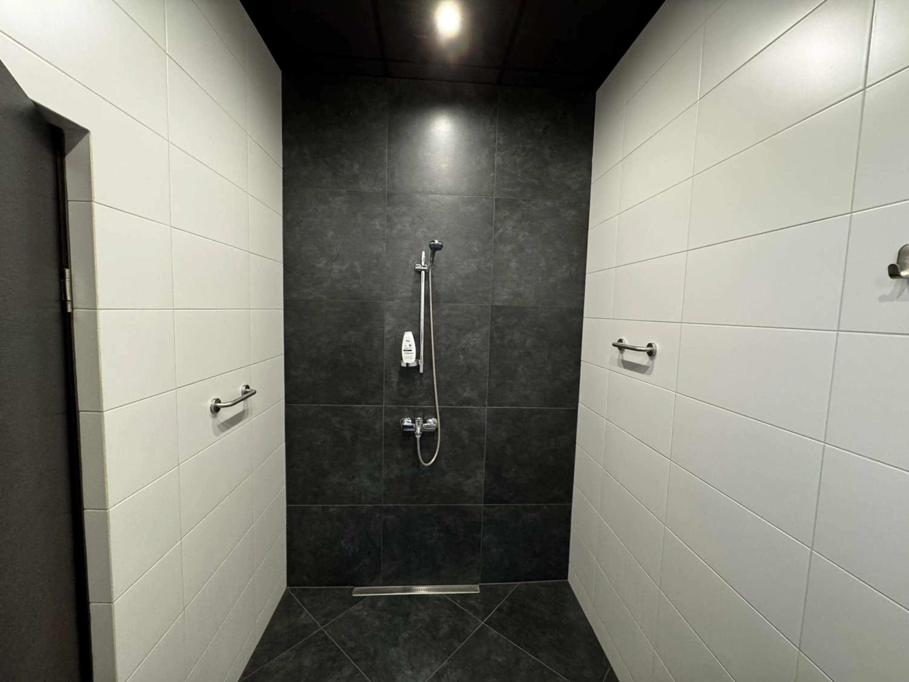 Shower in ApartHotel Riga