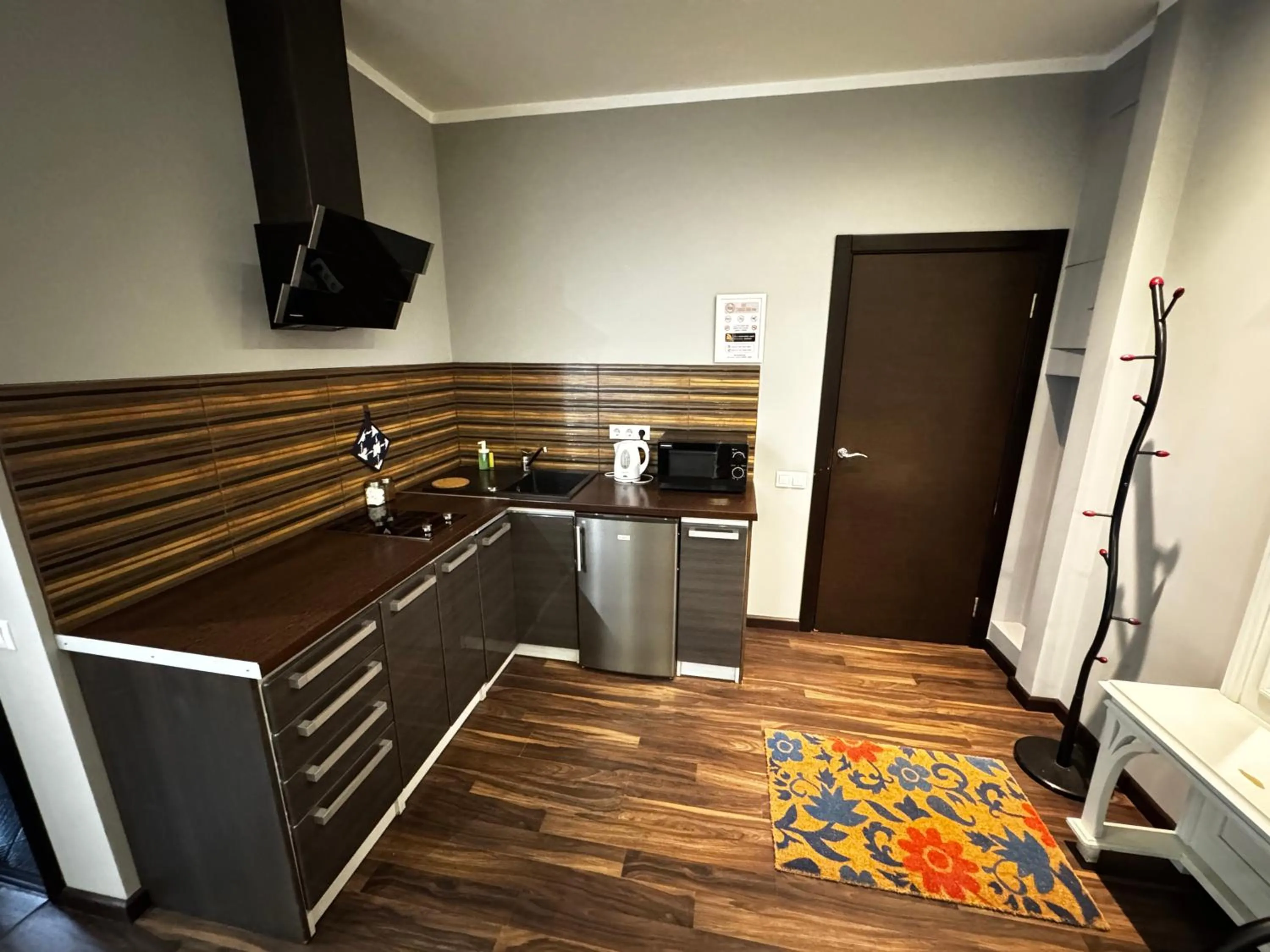 Kitchen or kitchenette in ApartHotel Riga