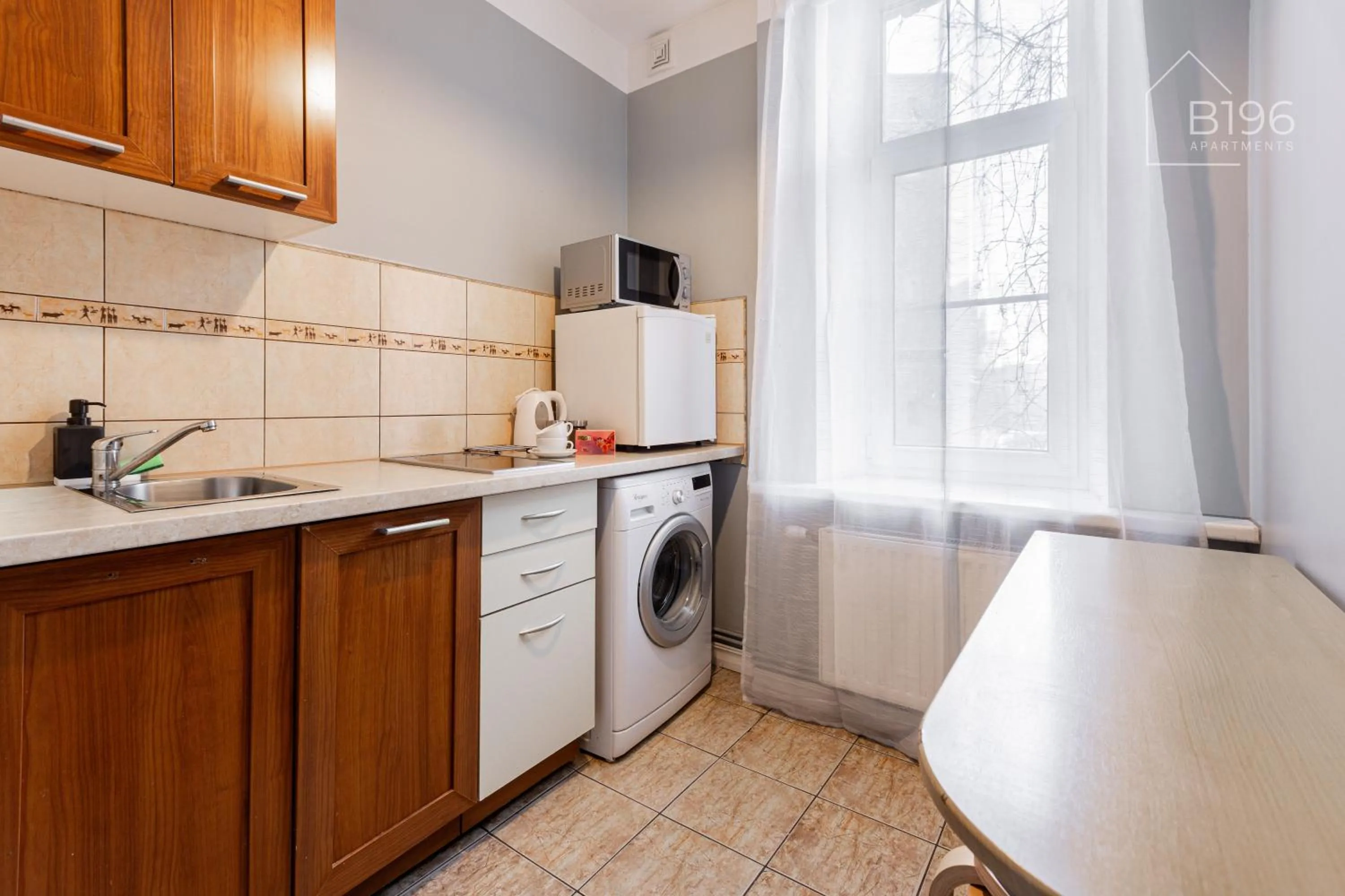 kitchen in ApartHotel Riga