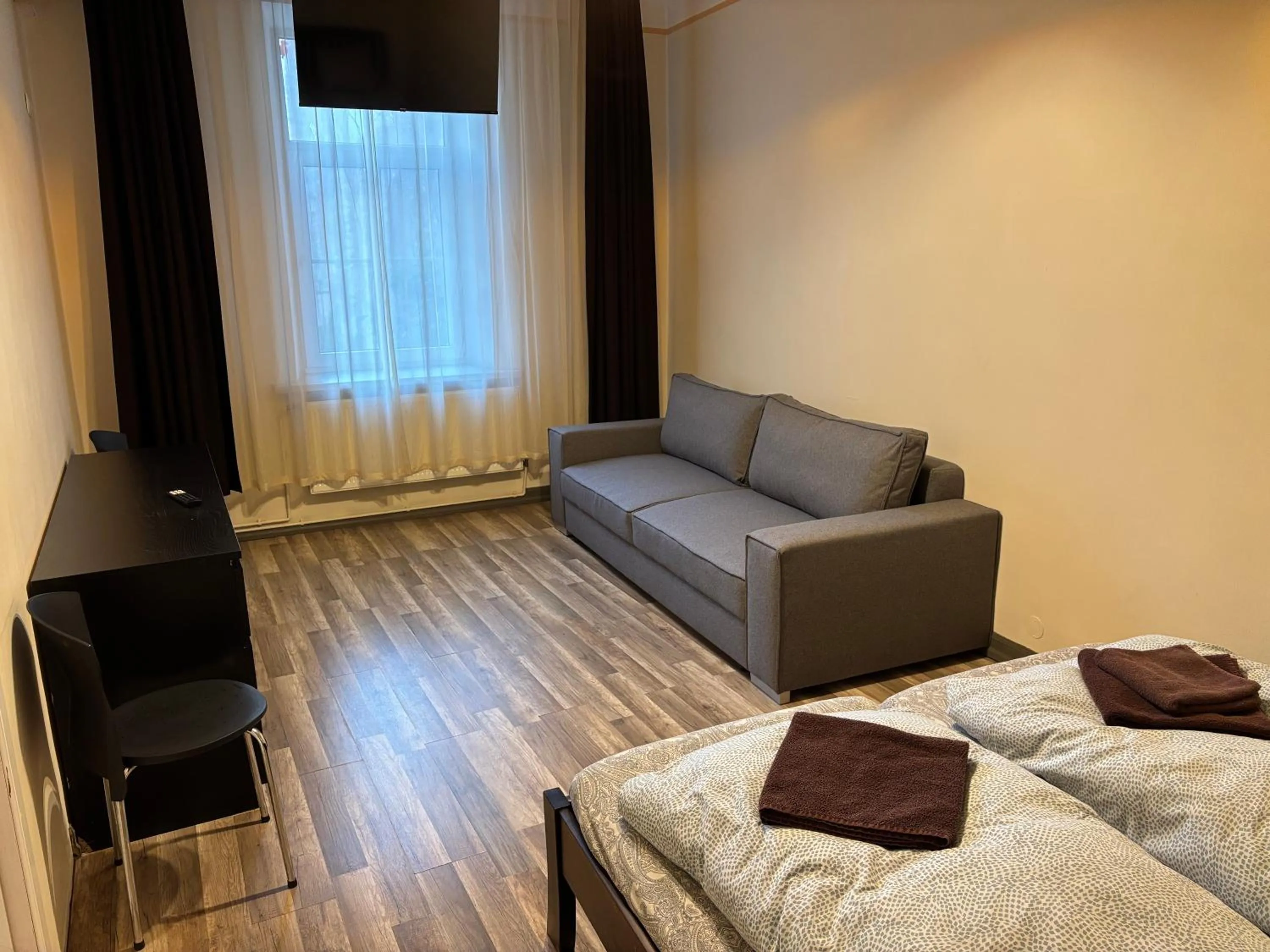 Photo of the whole room, Bed in ApartHotel Riga