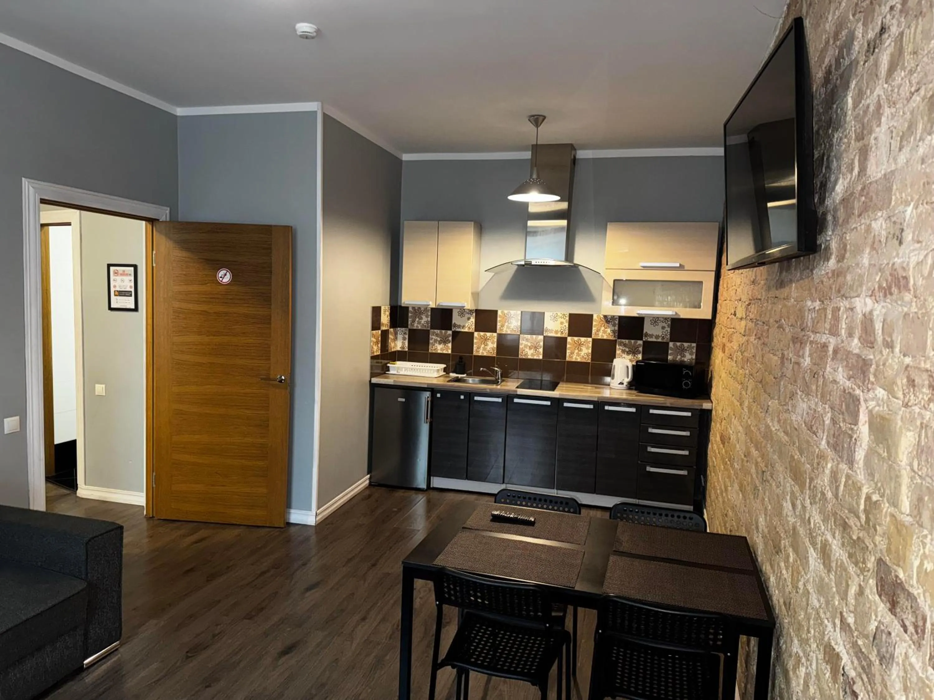 Kitchen or kitchenette in ApartHotel Riga