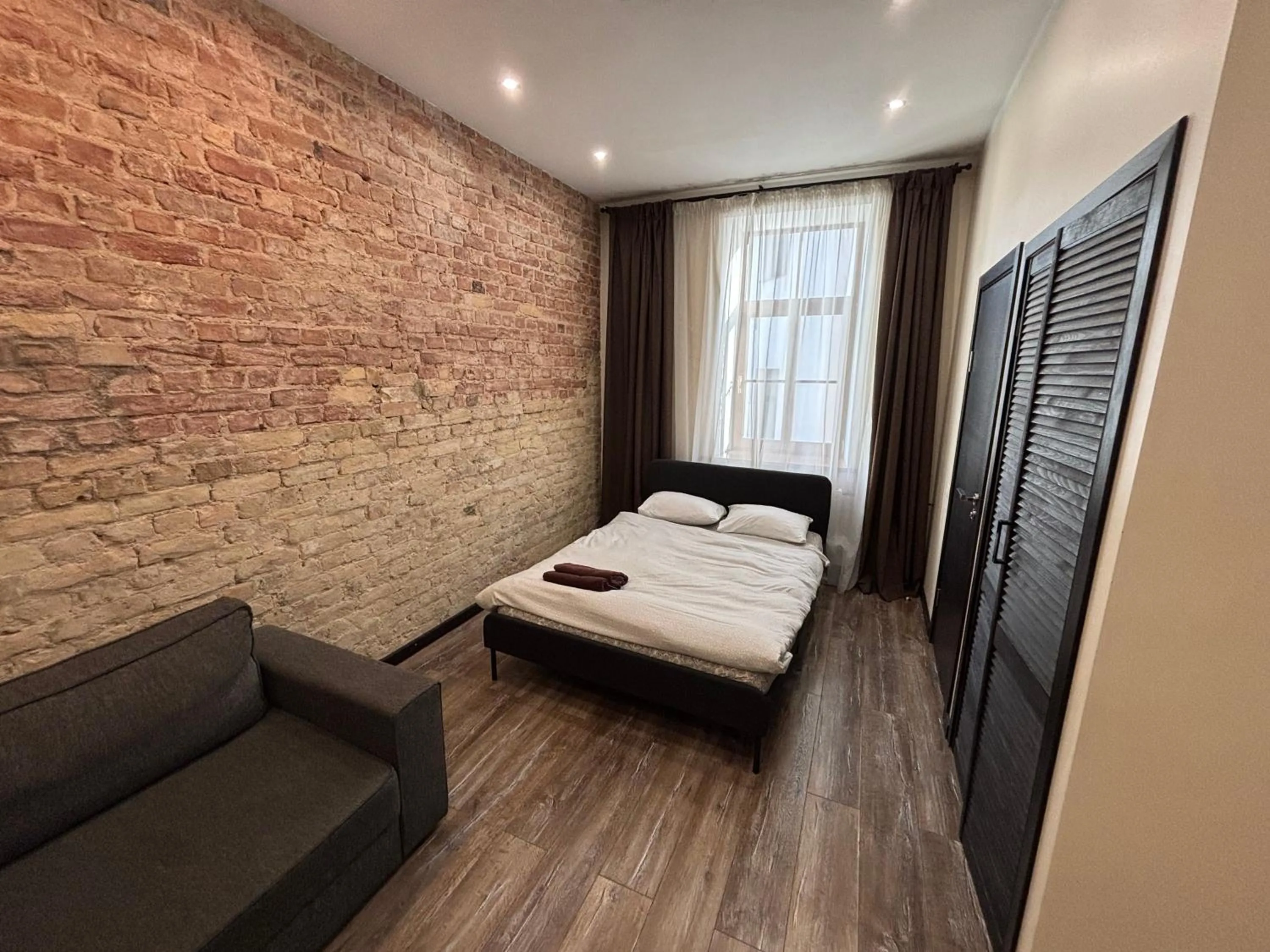 Photo of the whole room, Bed in ApartHotel Riga