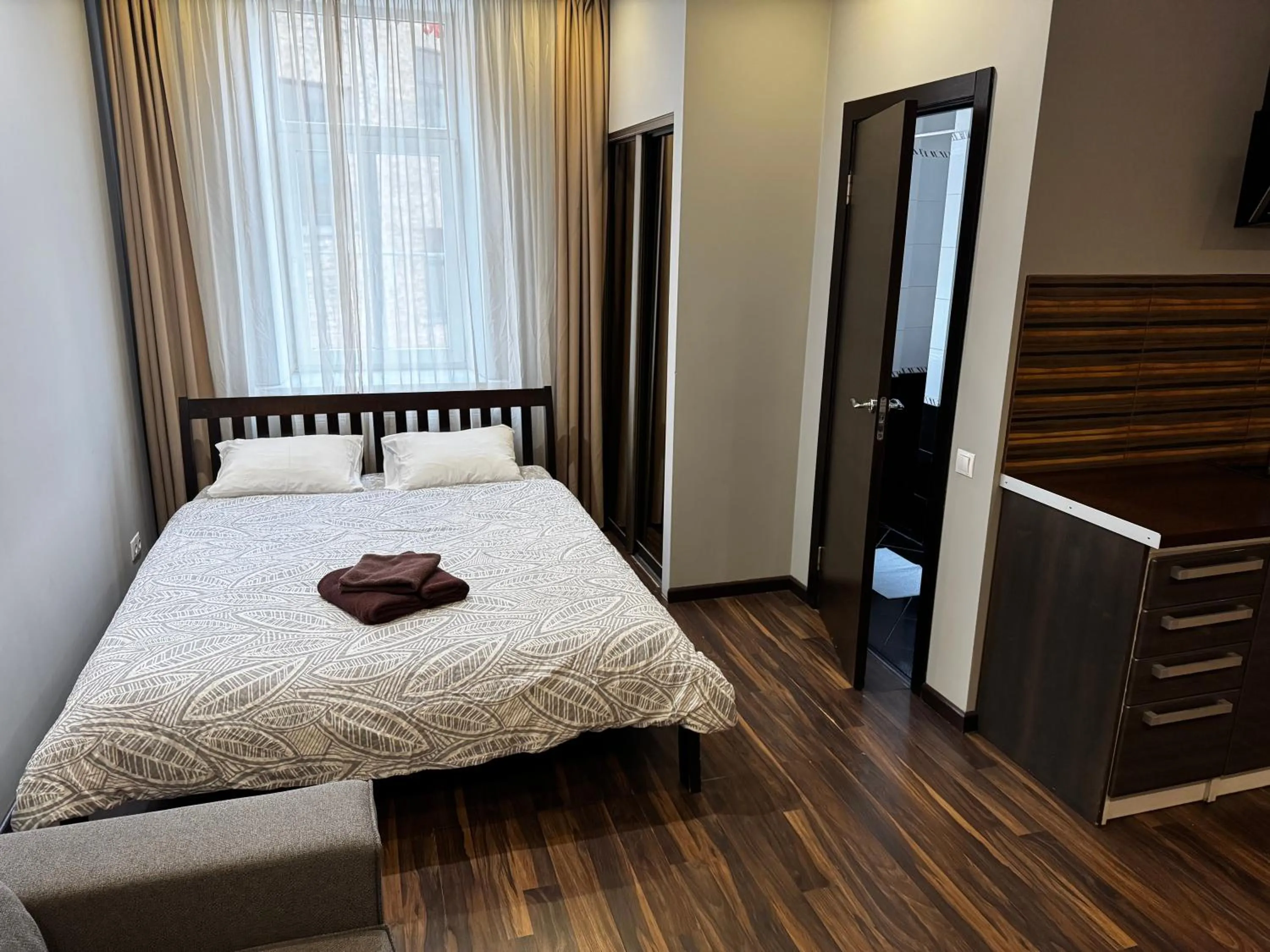 wardrobe, Bed in ApartHotel Riga