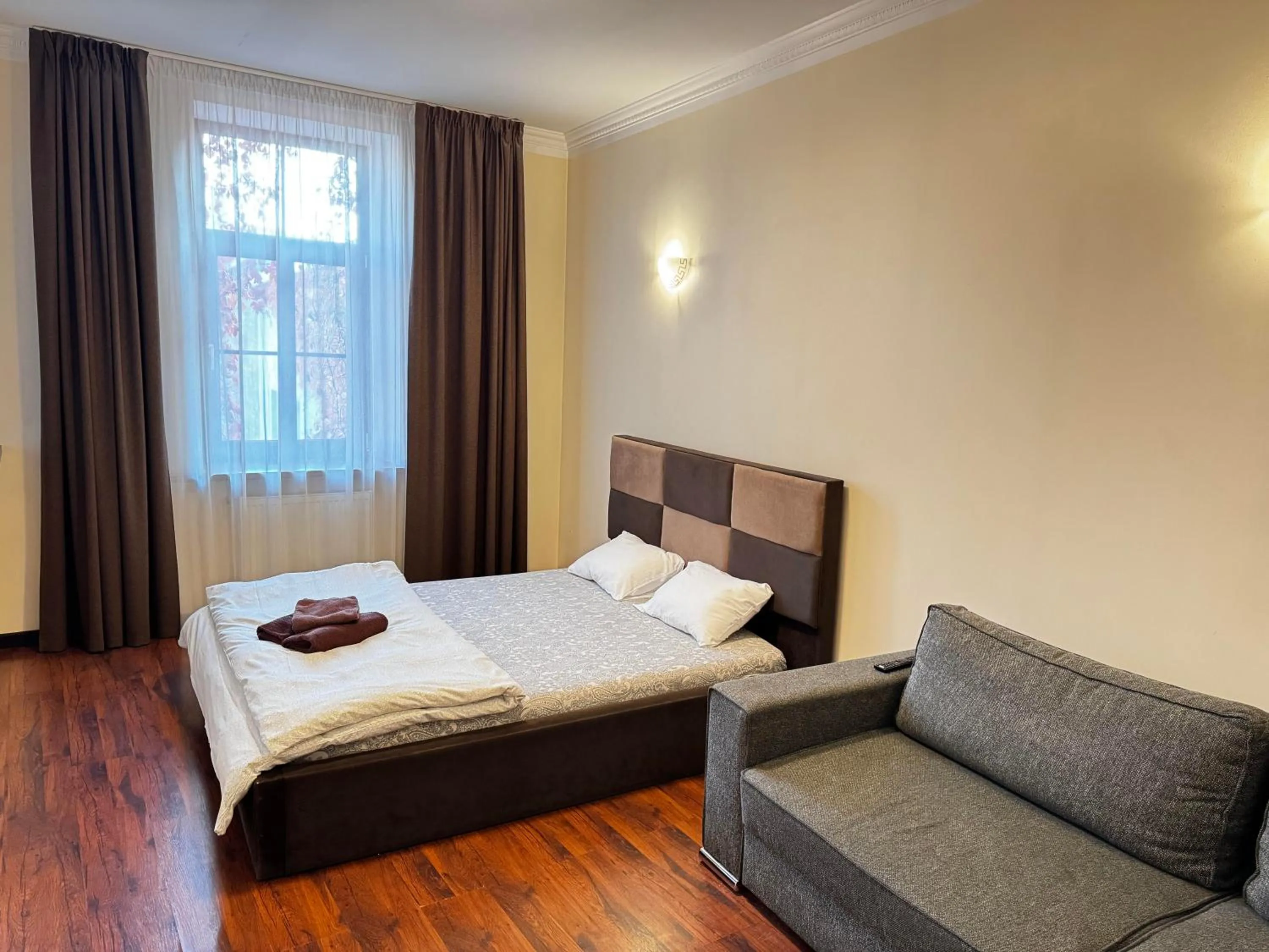 Photo of the whole room, Bed in ApartHotel Riga