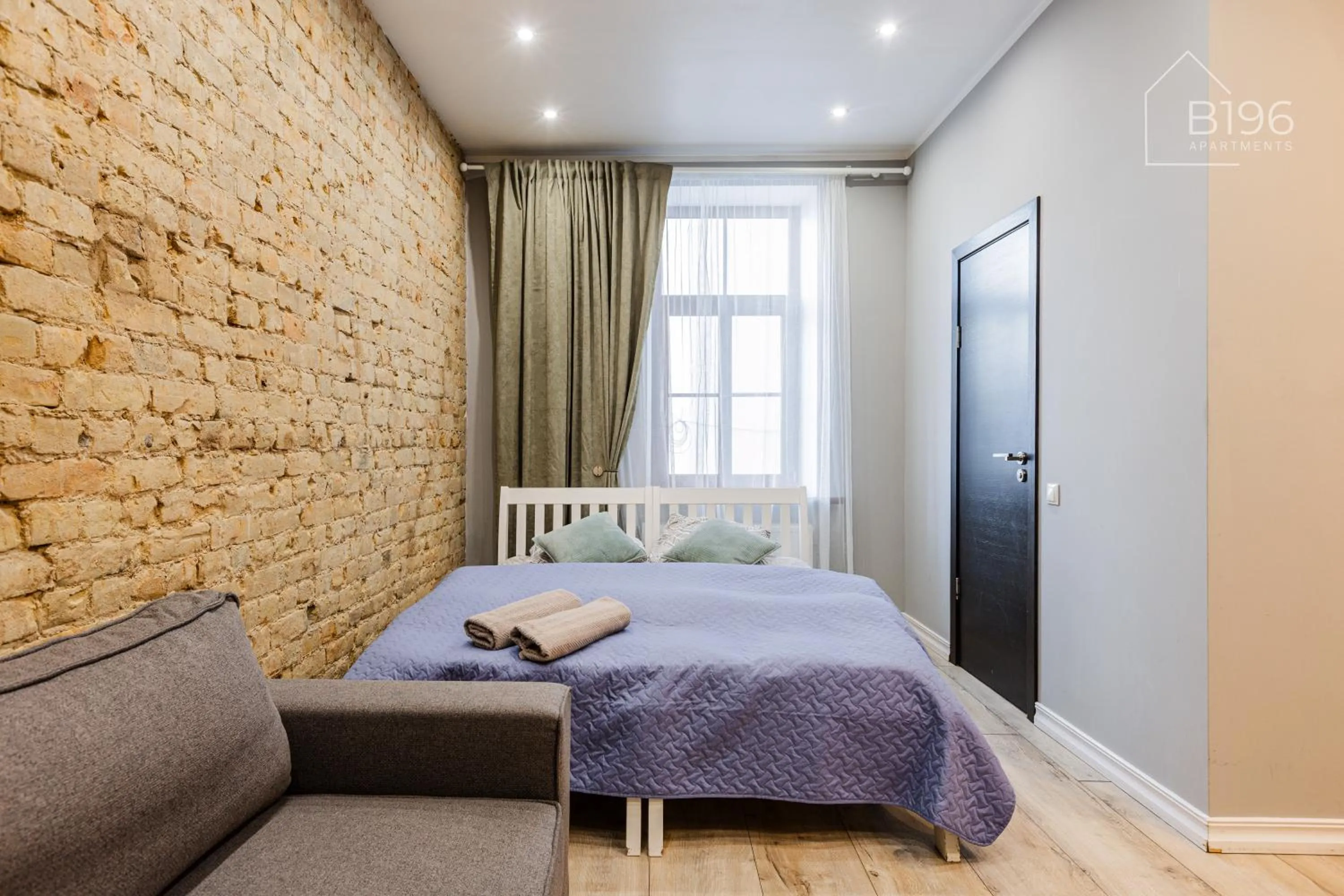 Photo of the whole room, Bed in ApartHotel Riga