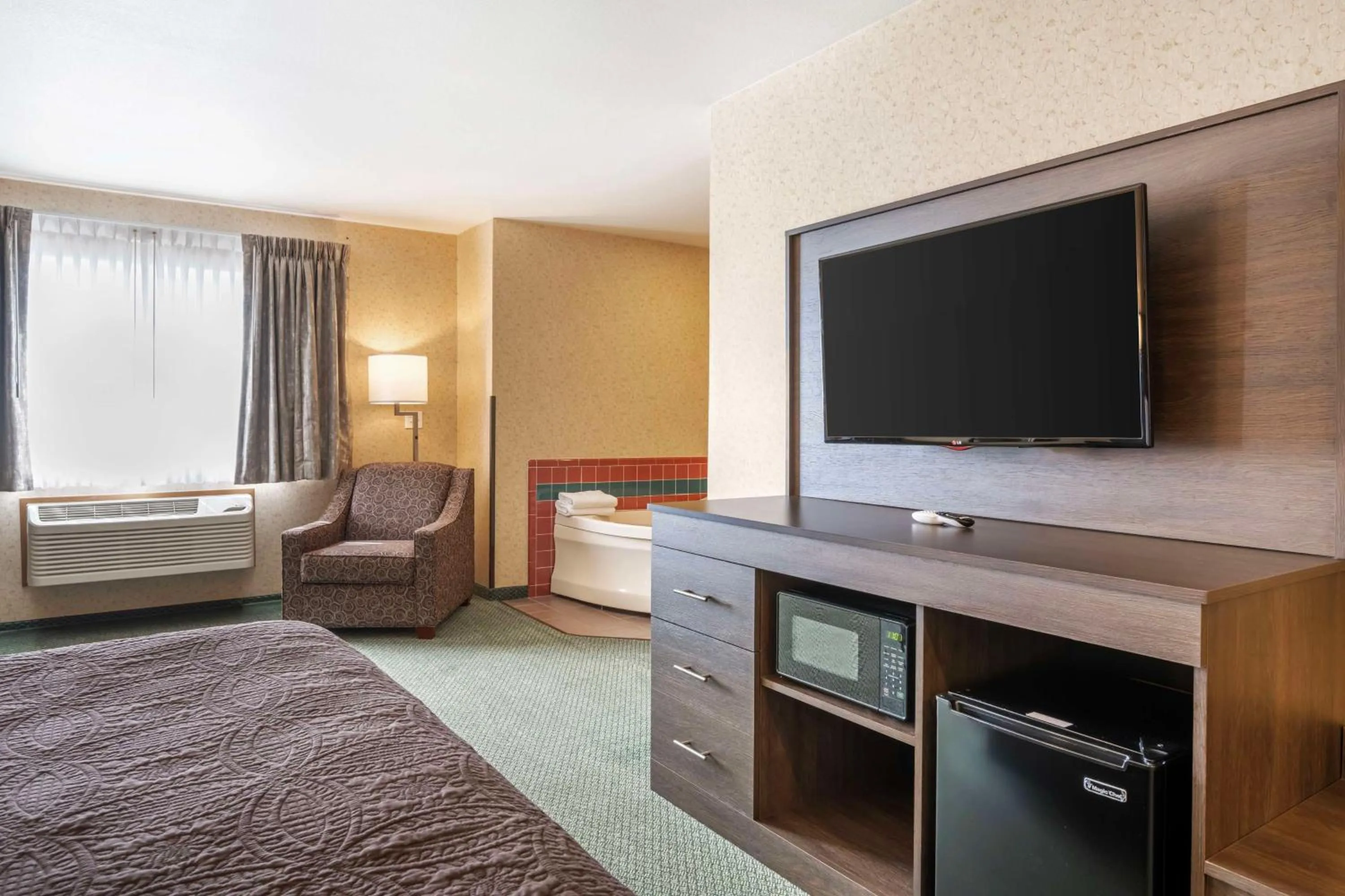 Bedroom, Bed in SureStay Plus by Best Western Enterprise