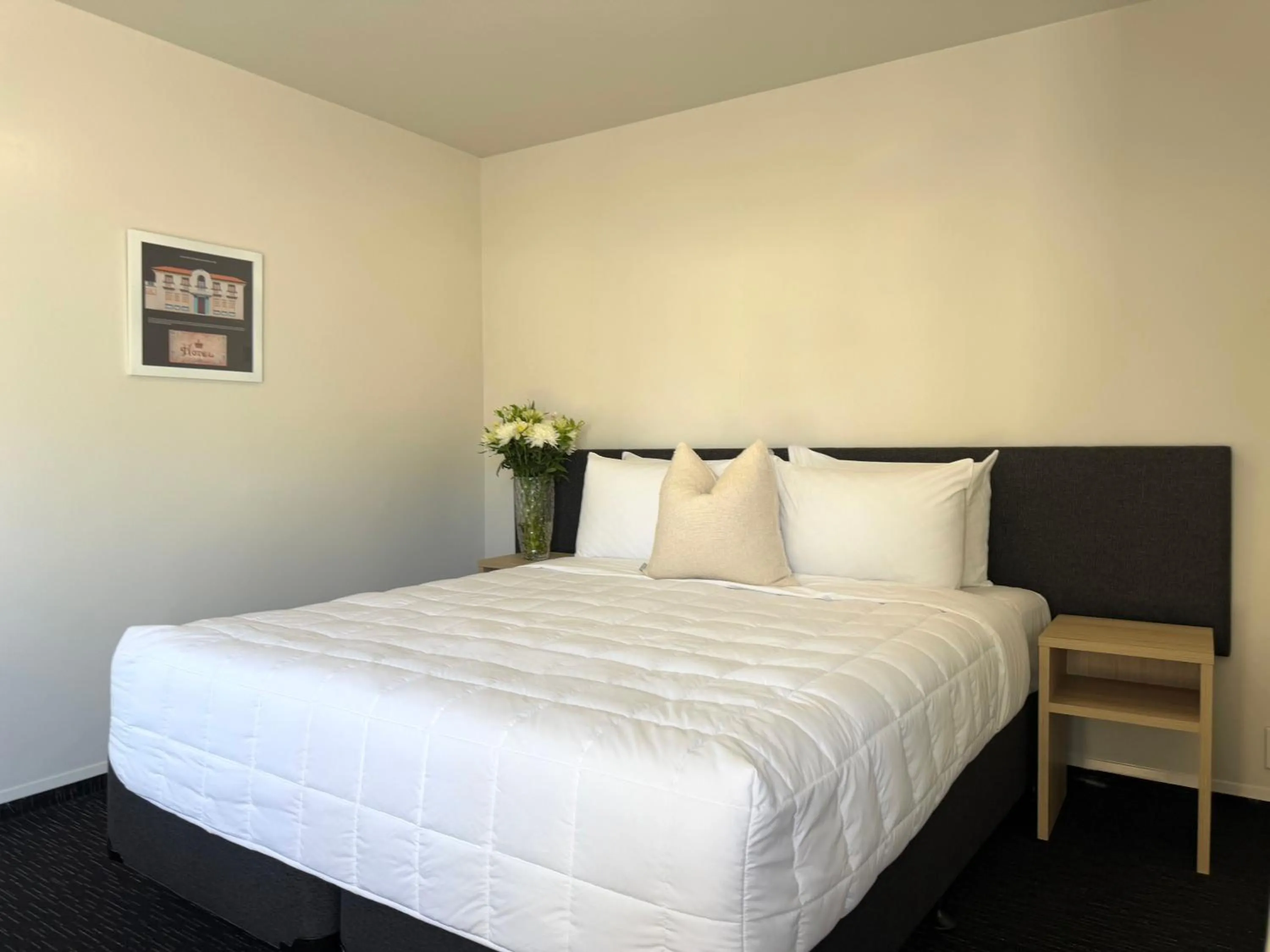 Bed in Bluewater Hotel