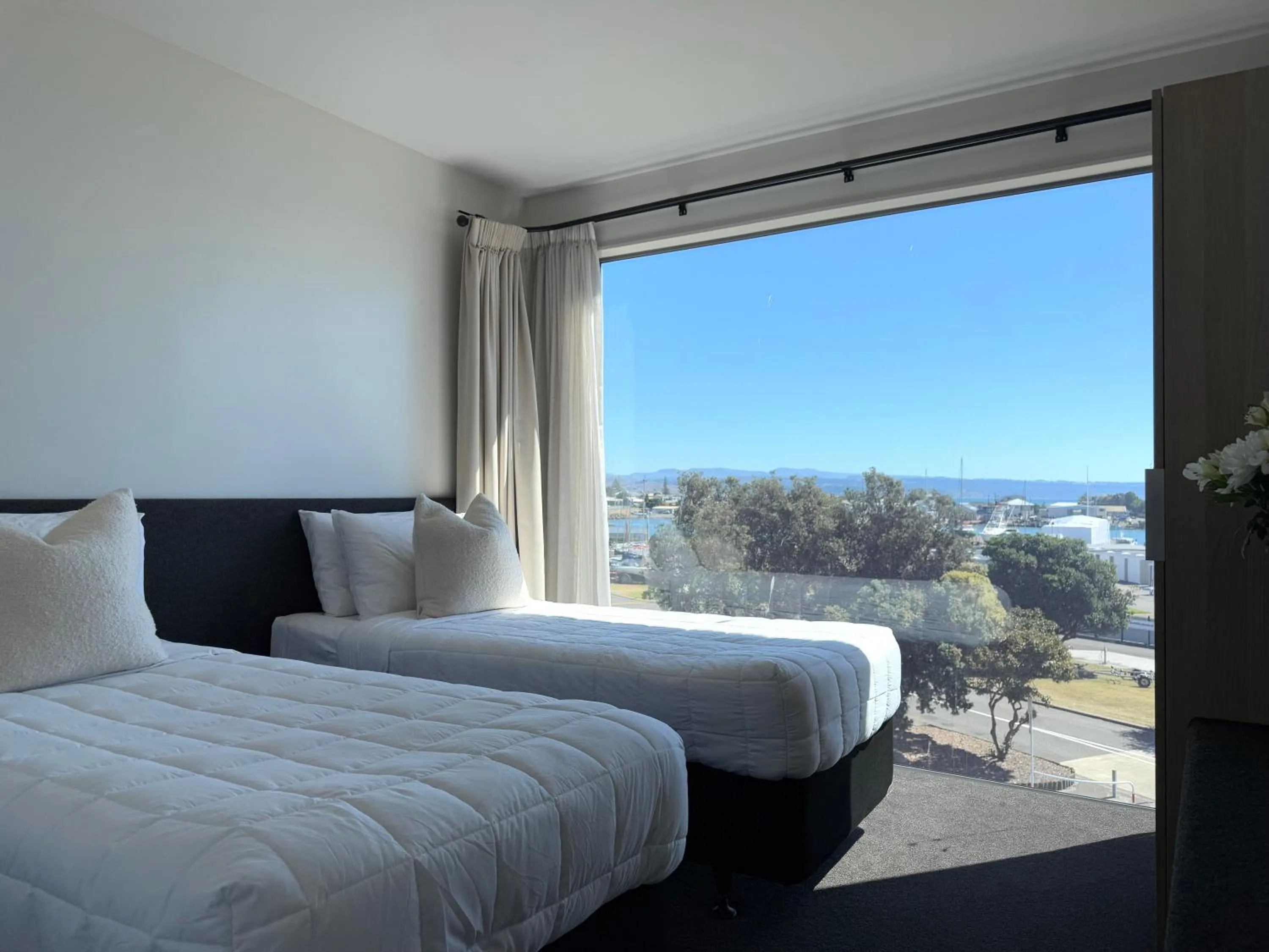 Bed in Bluewater Hotel